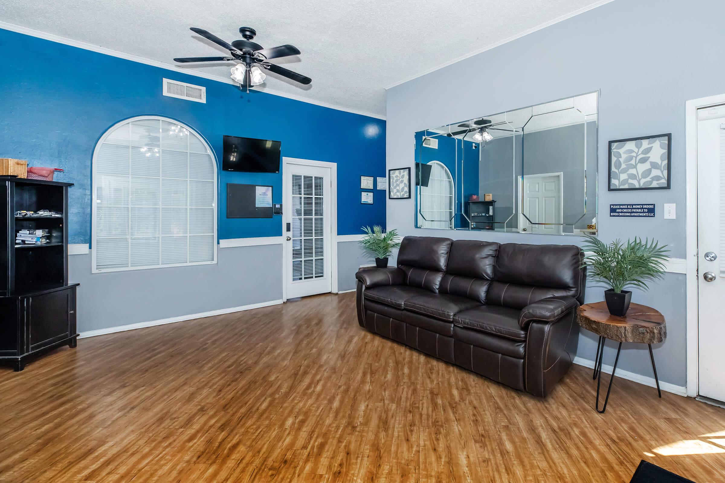 a living room with a wood floor