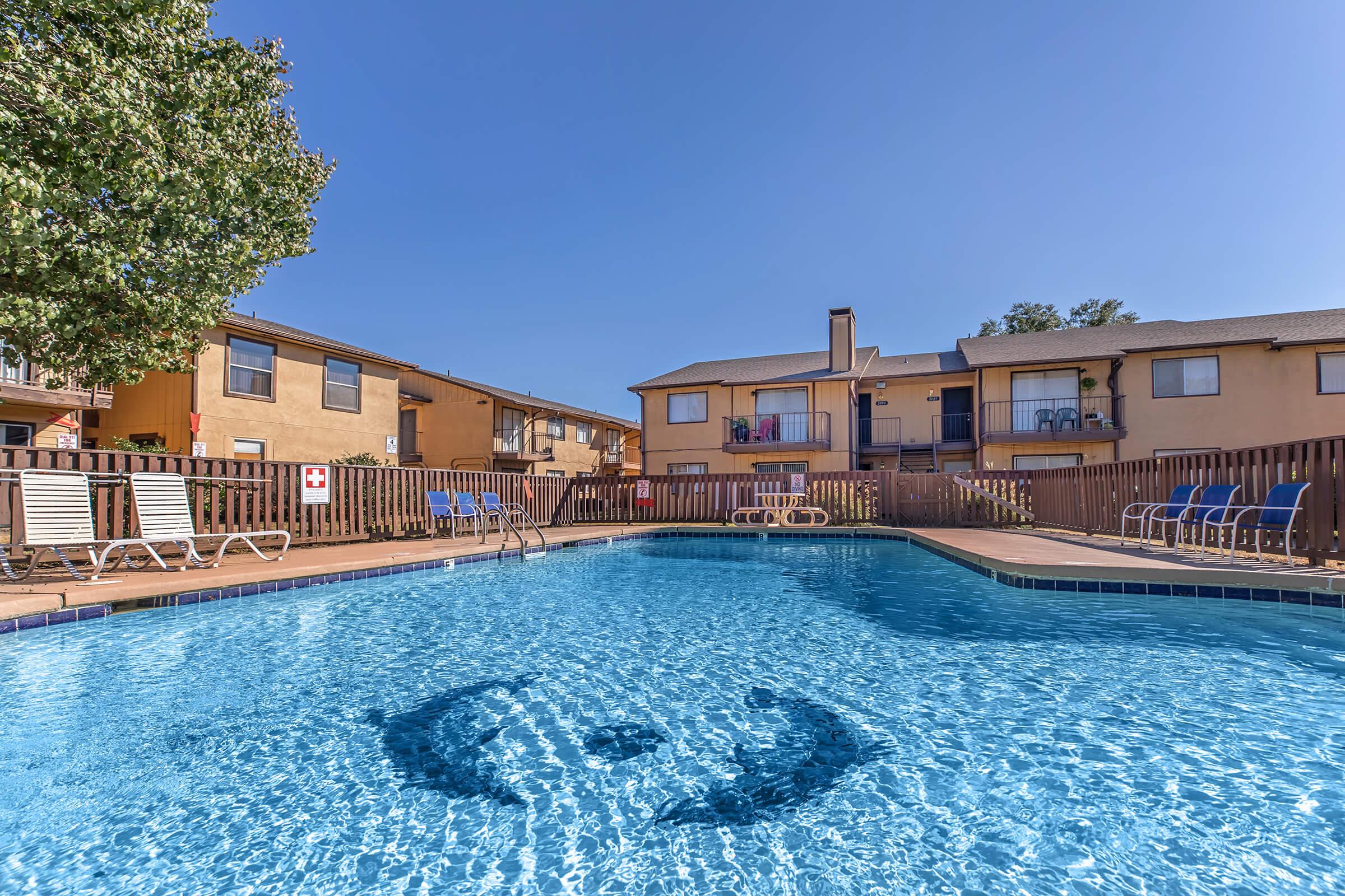 a pool next to a body of water