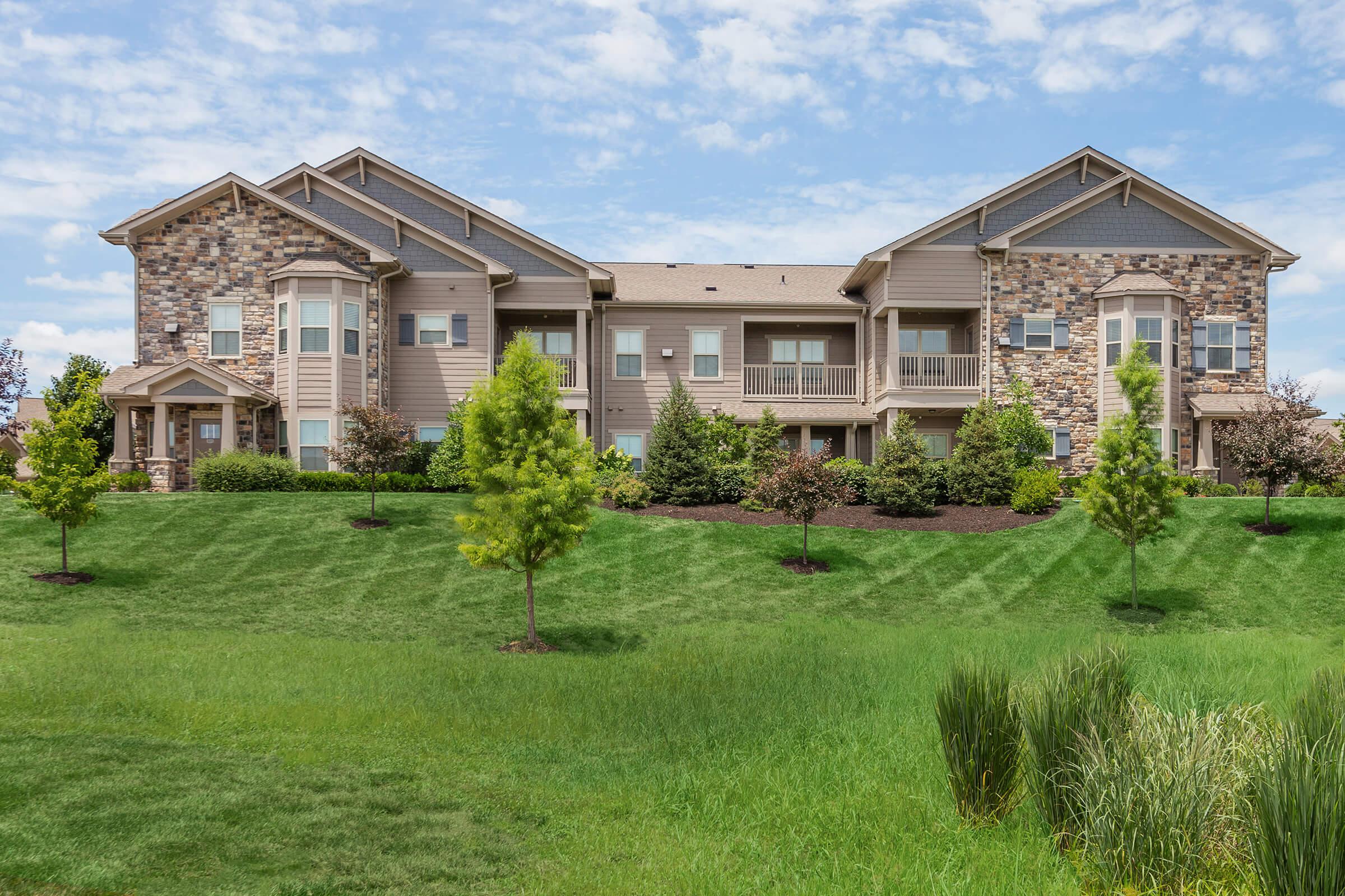 a large lawn in front of a house