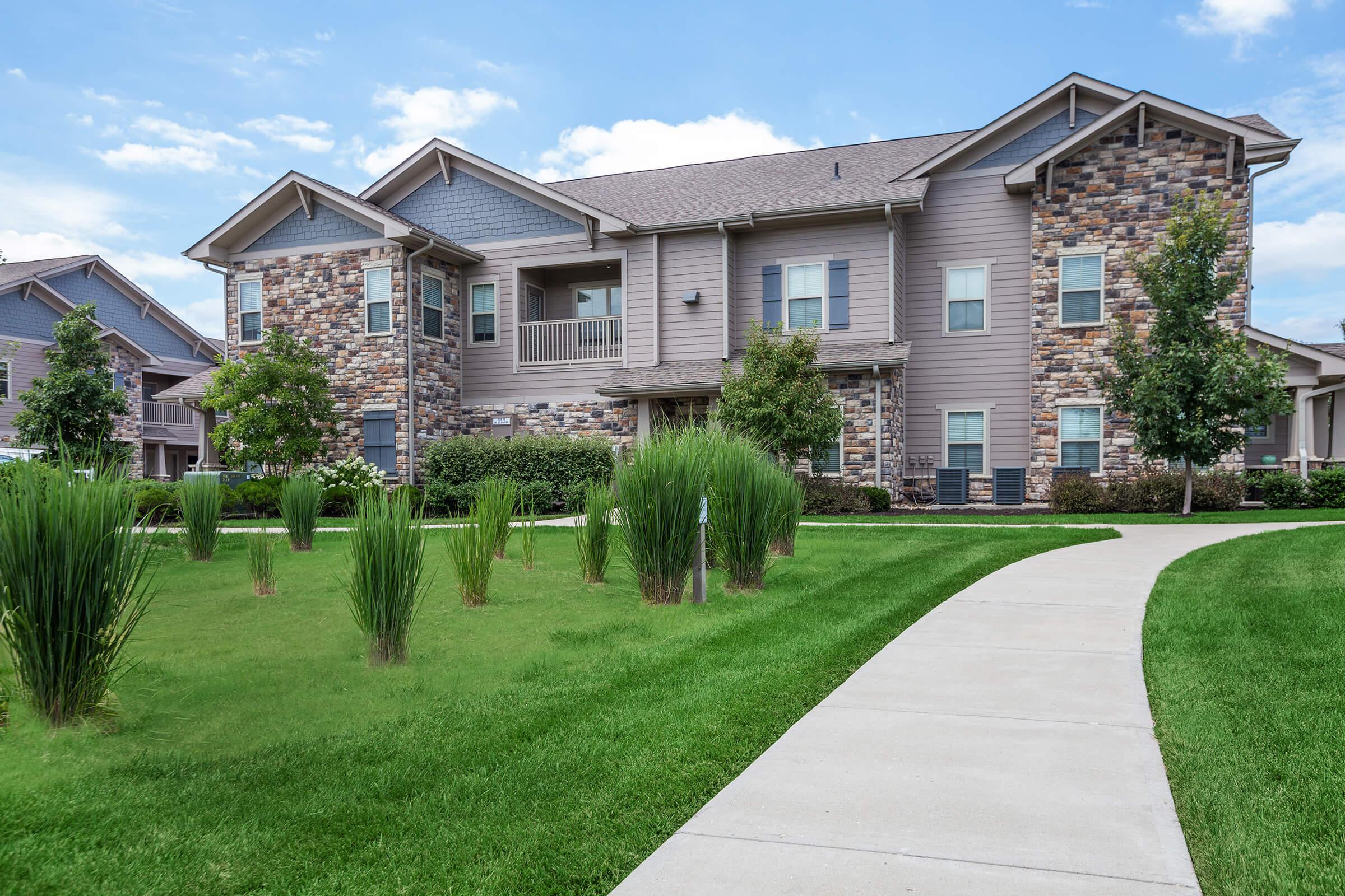 a large lawn in front of a house