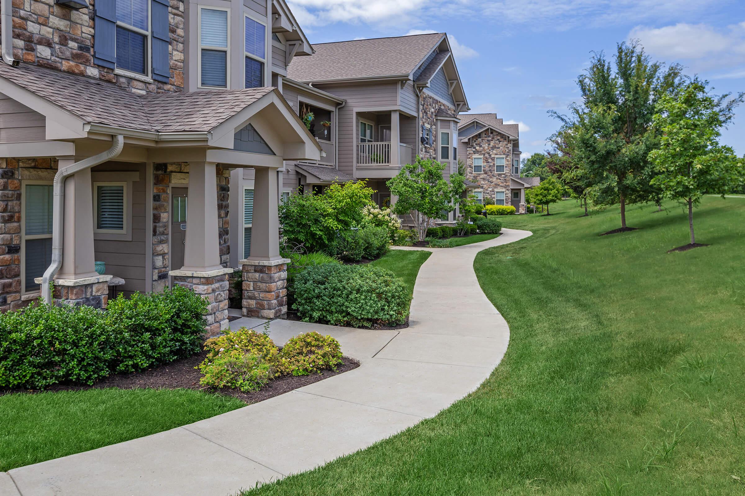 a large lawn in front of a house