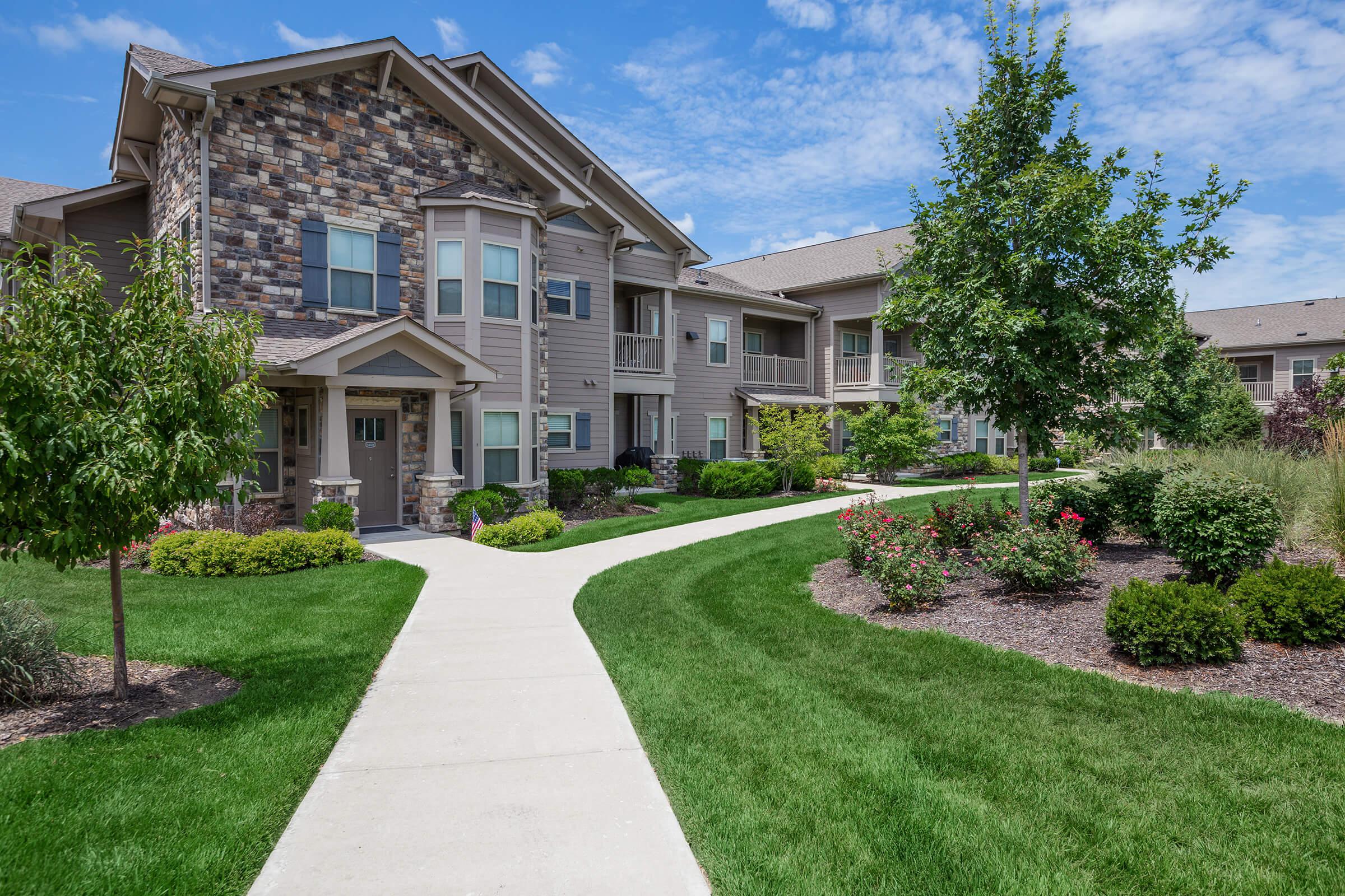 a large lawn in front of a house