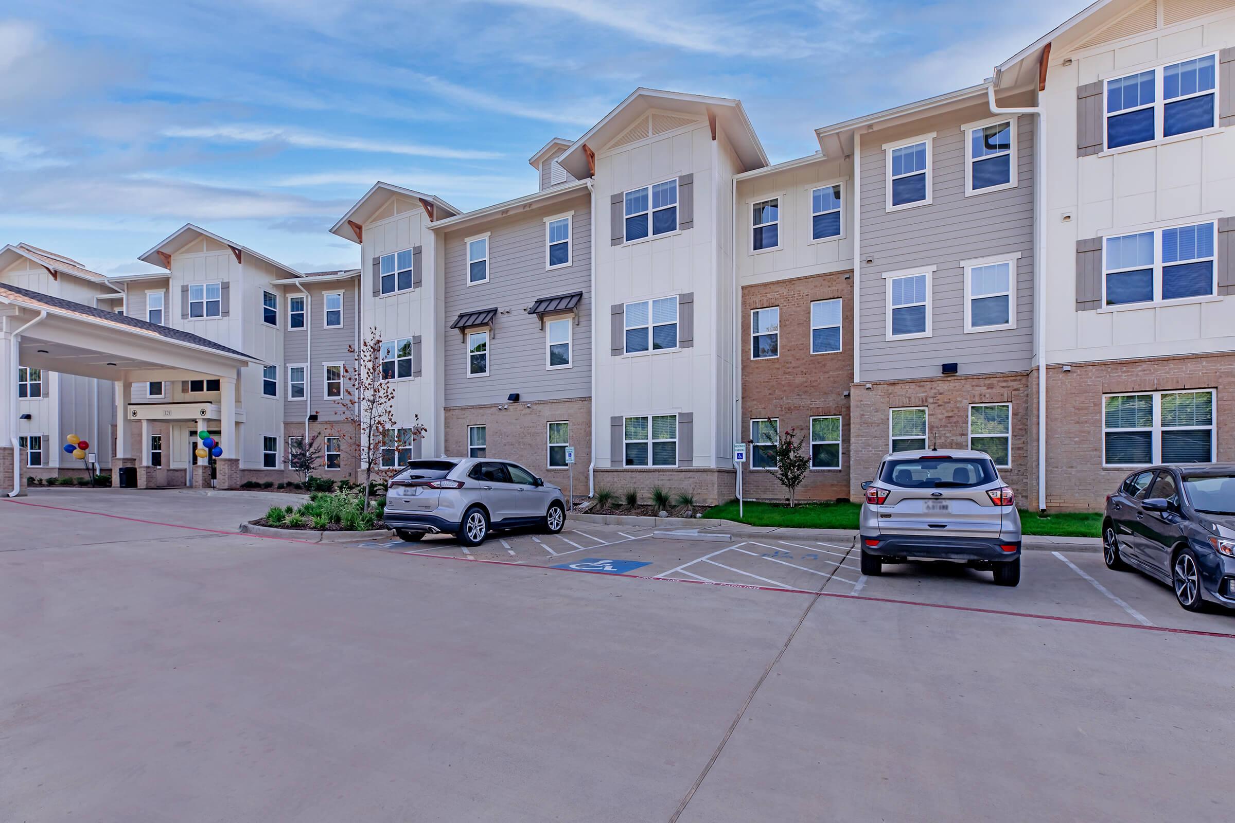 a building with a parking lot