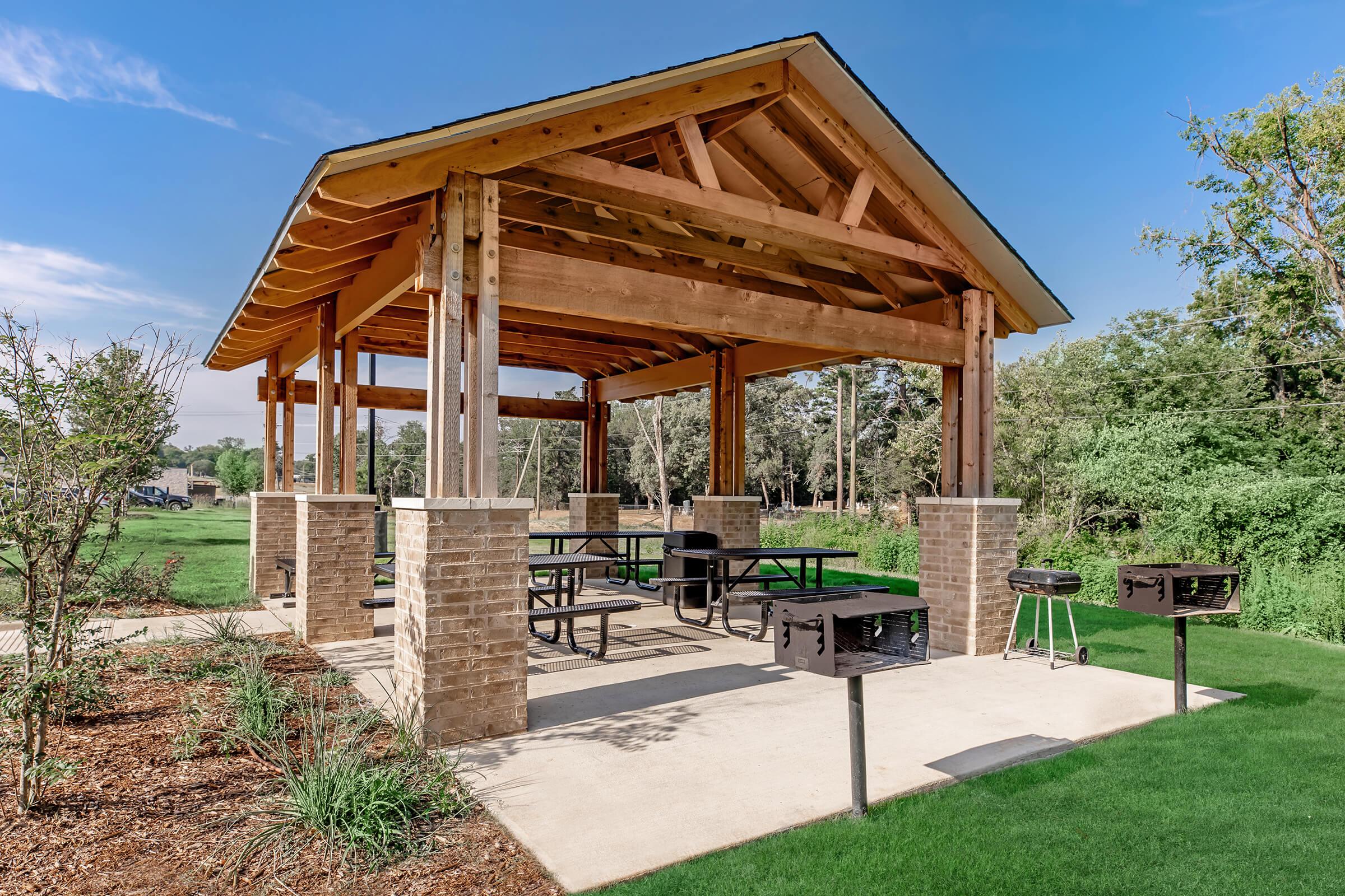 a group of lawn chairs sitting on top of a wooden house