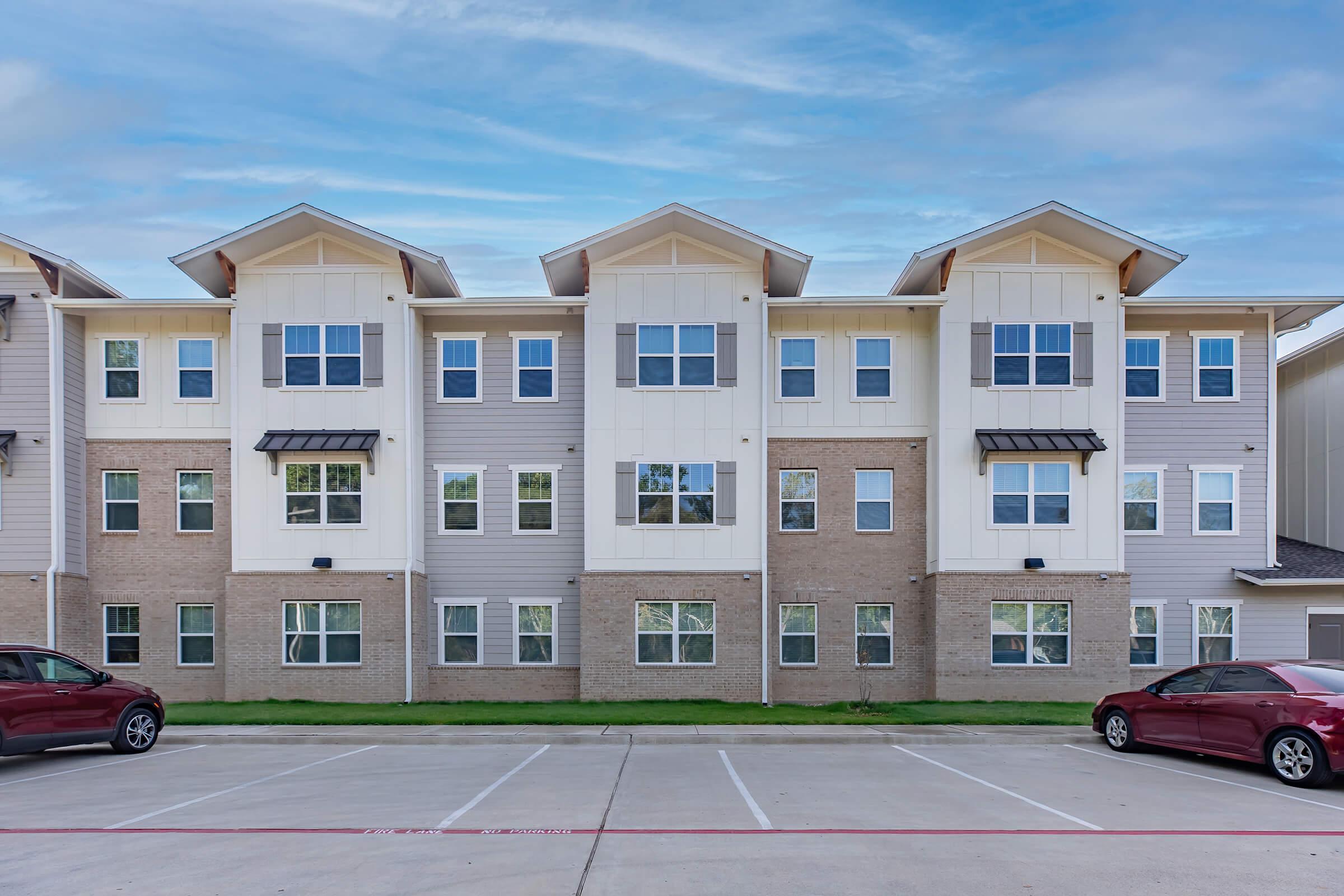 a house that is parked on the side of a building