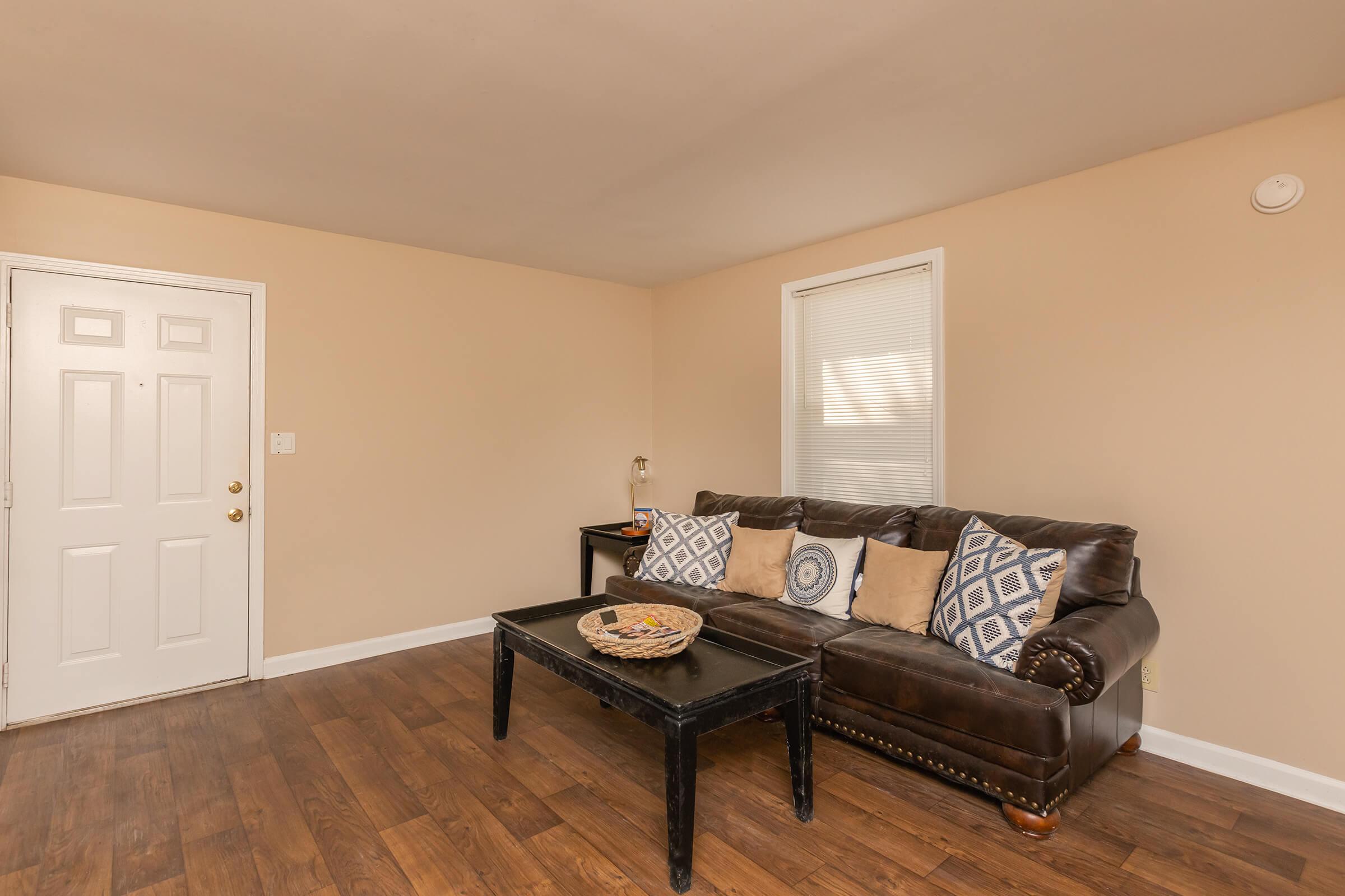 a living room with a wood floor