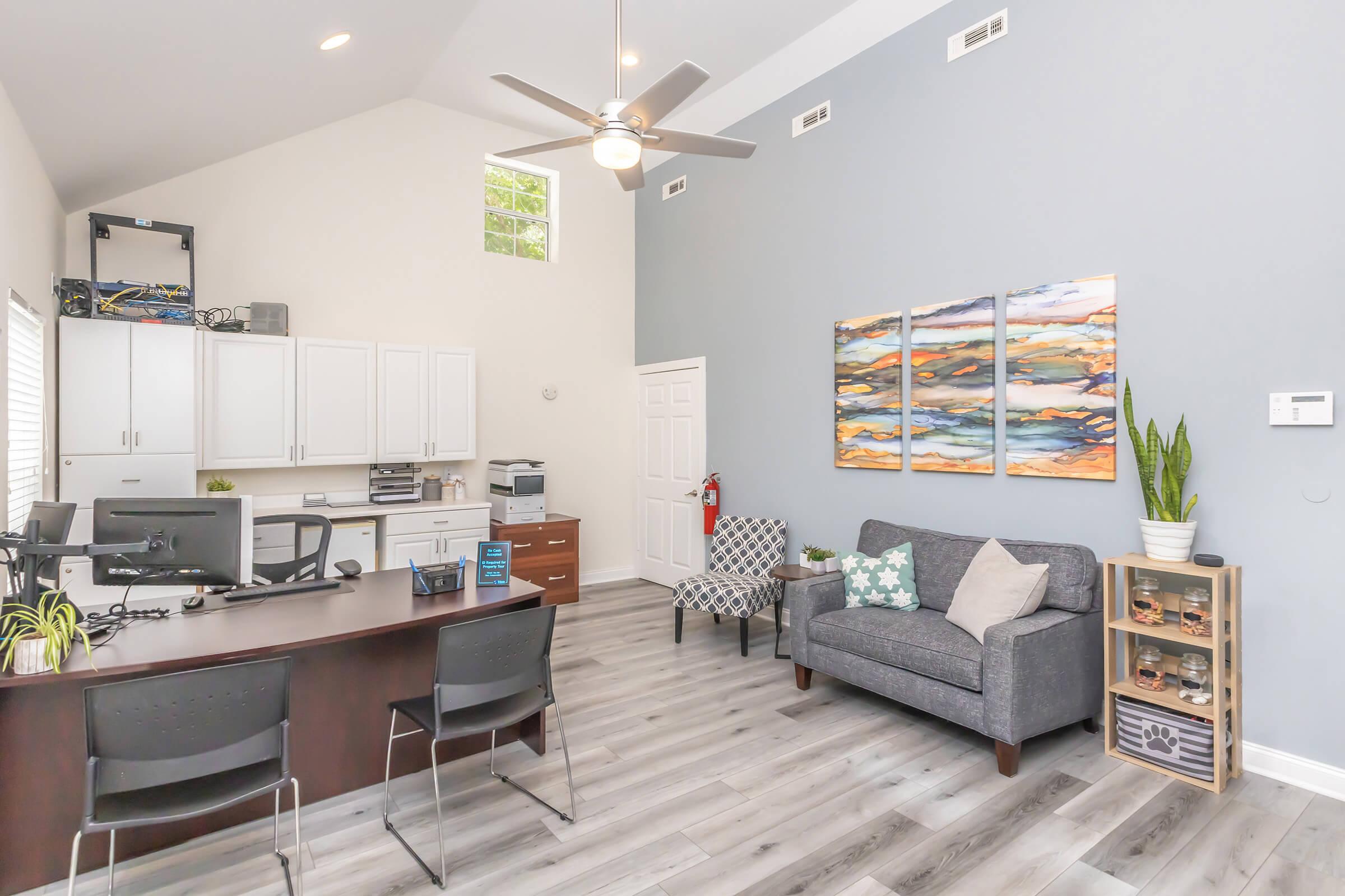 a living room filled with lots of furniture