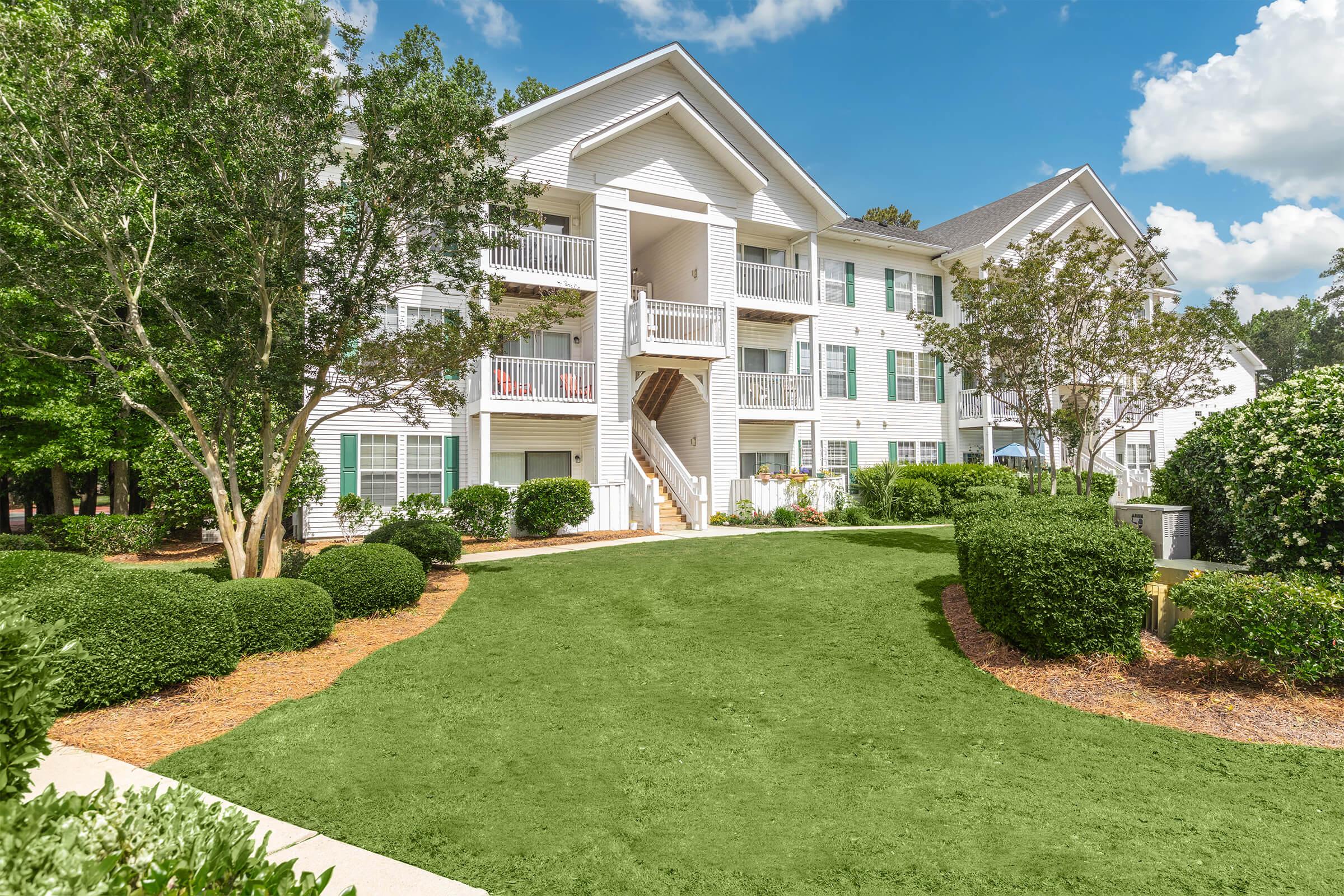 a large lawn in front of a house