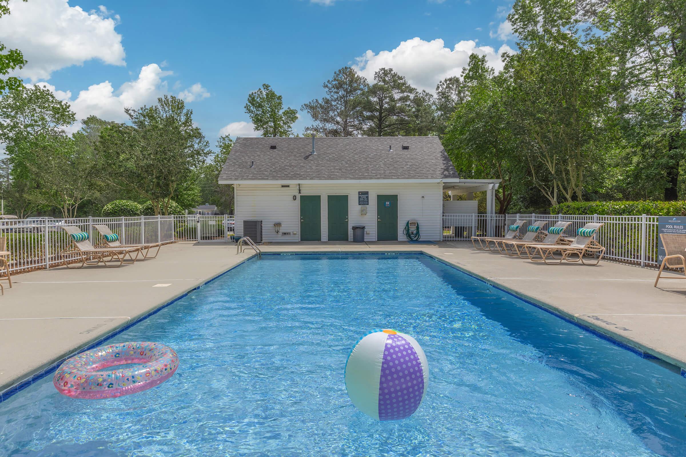 a pool next to a body of water