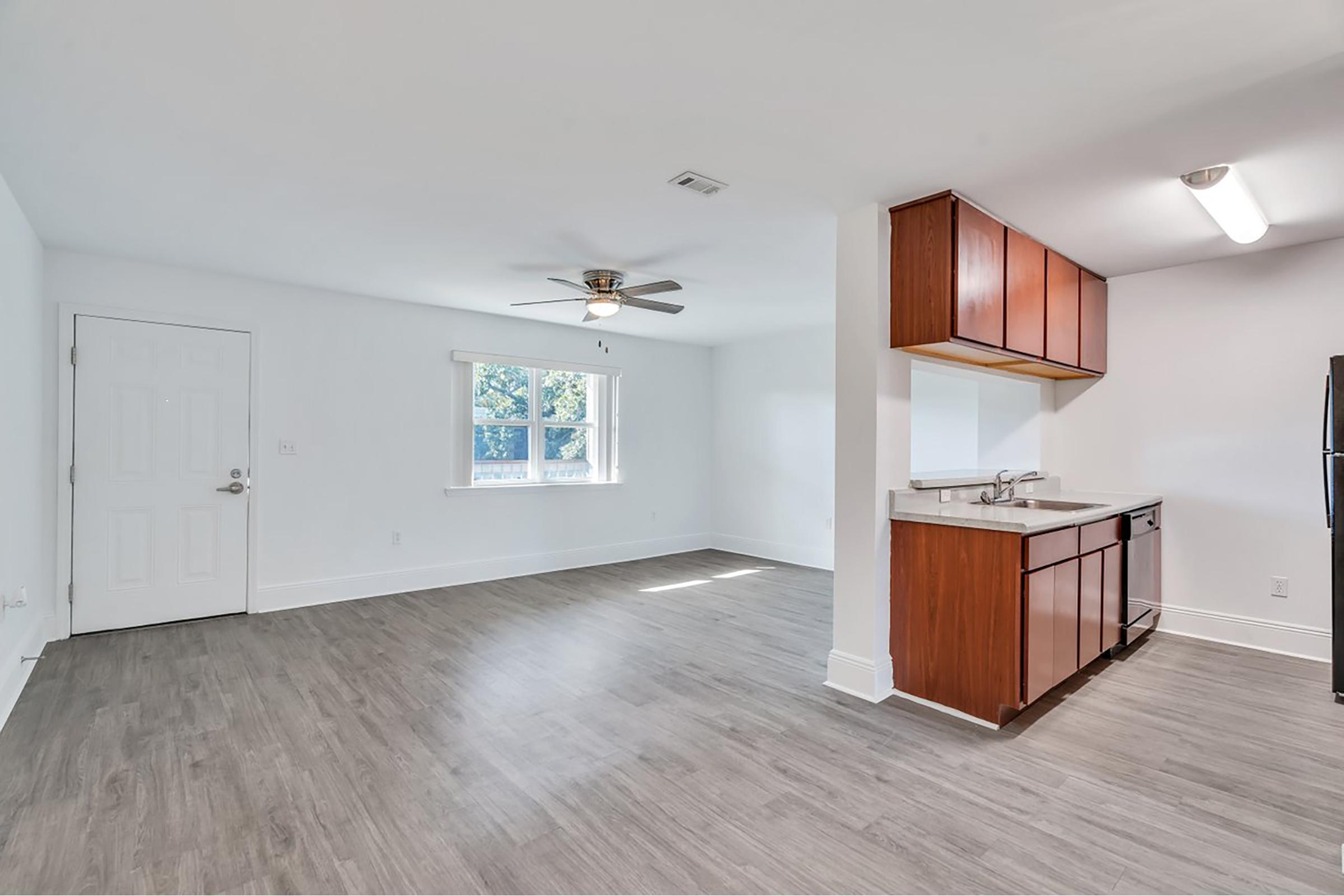 a kitchen with a wood floor