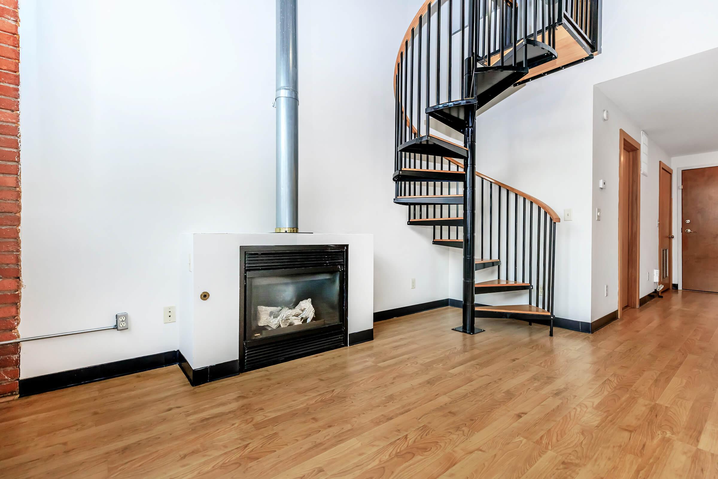 a living room with a wood floor