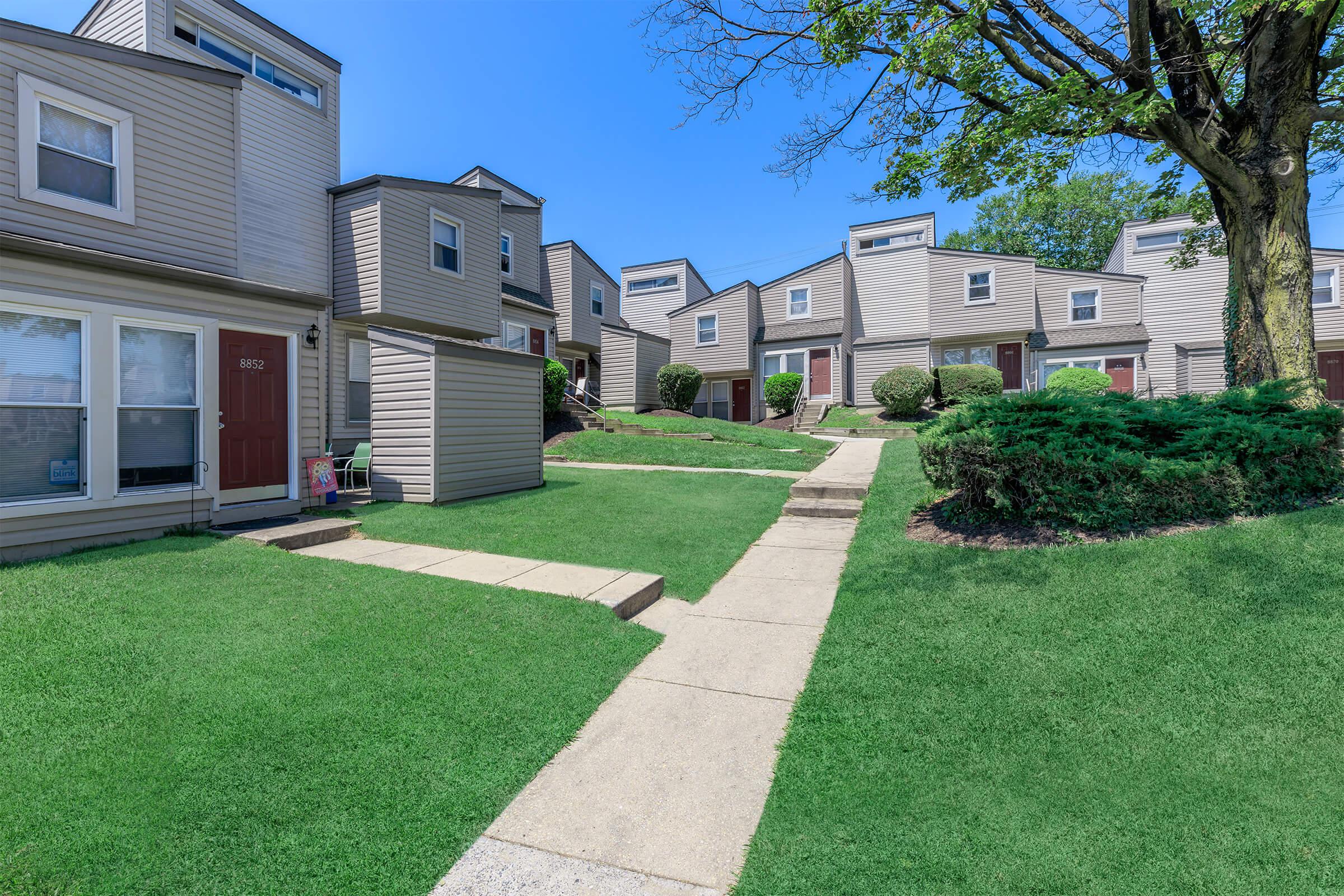 a large lawn in front of a house