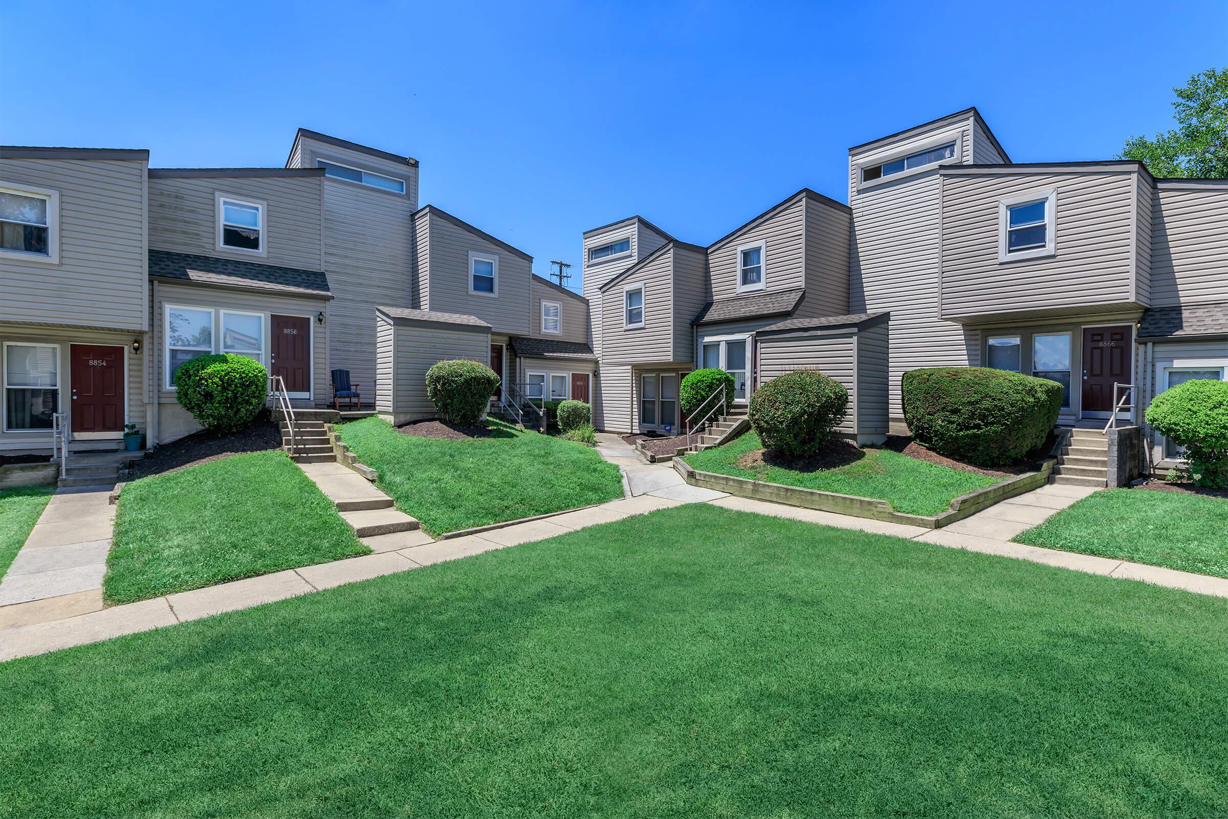 a large lawn in front of a building