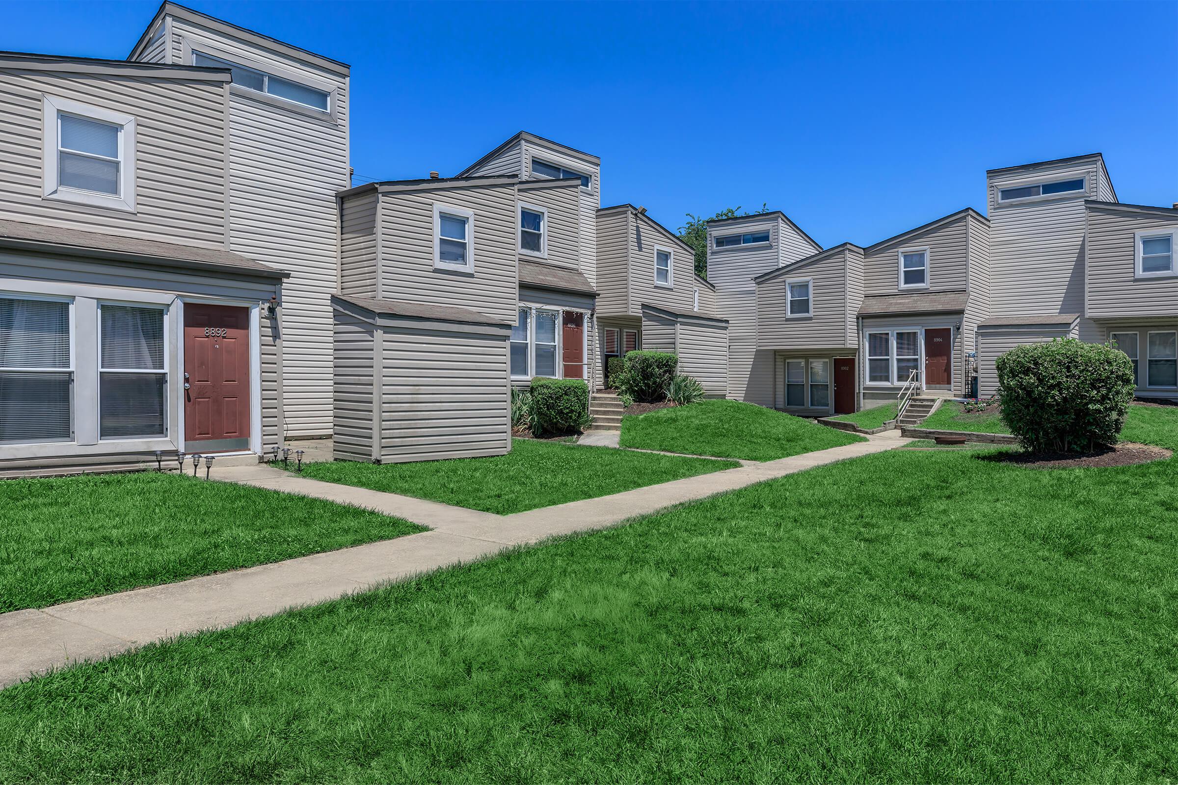 a large lawn in front of a house