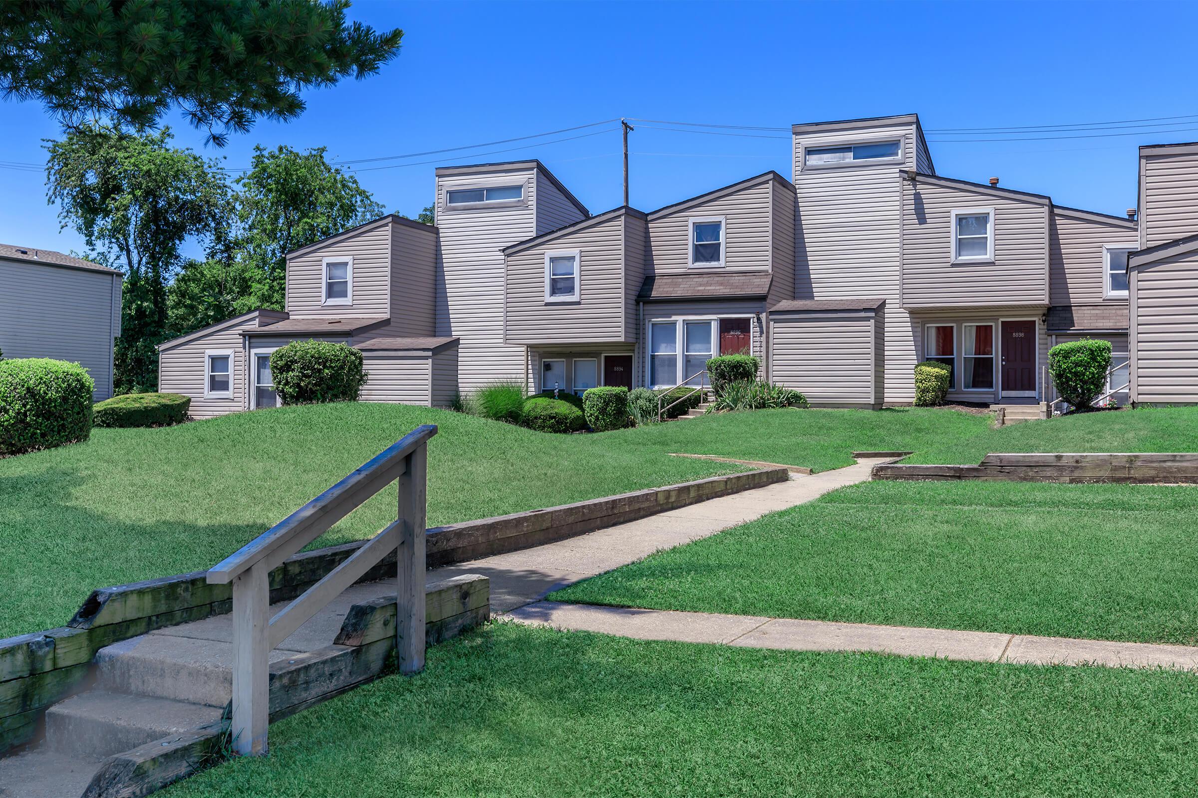 a large lawn in front of a house