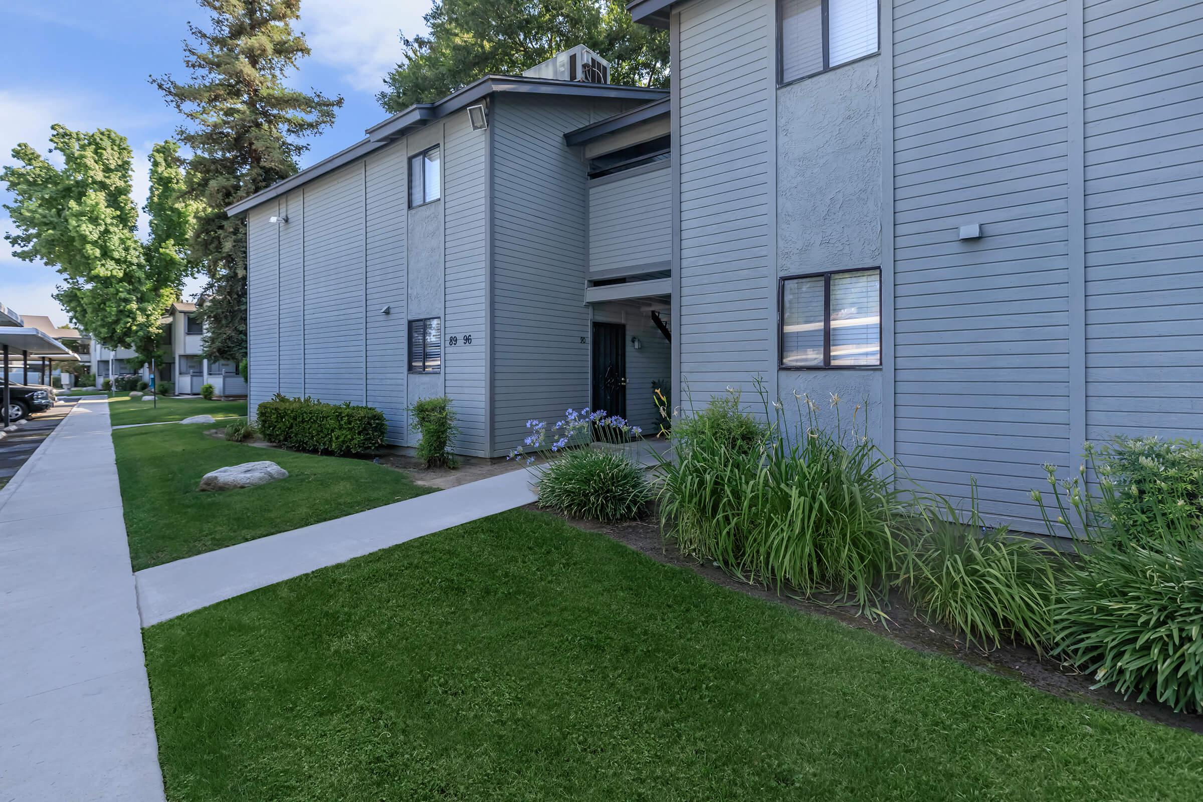 a large lawn in front of a house