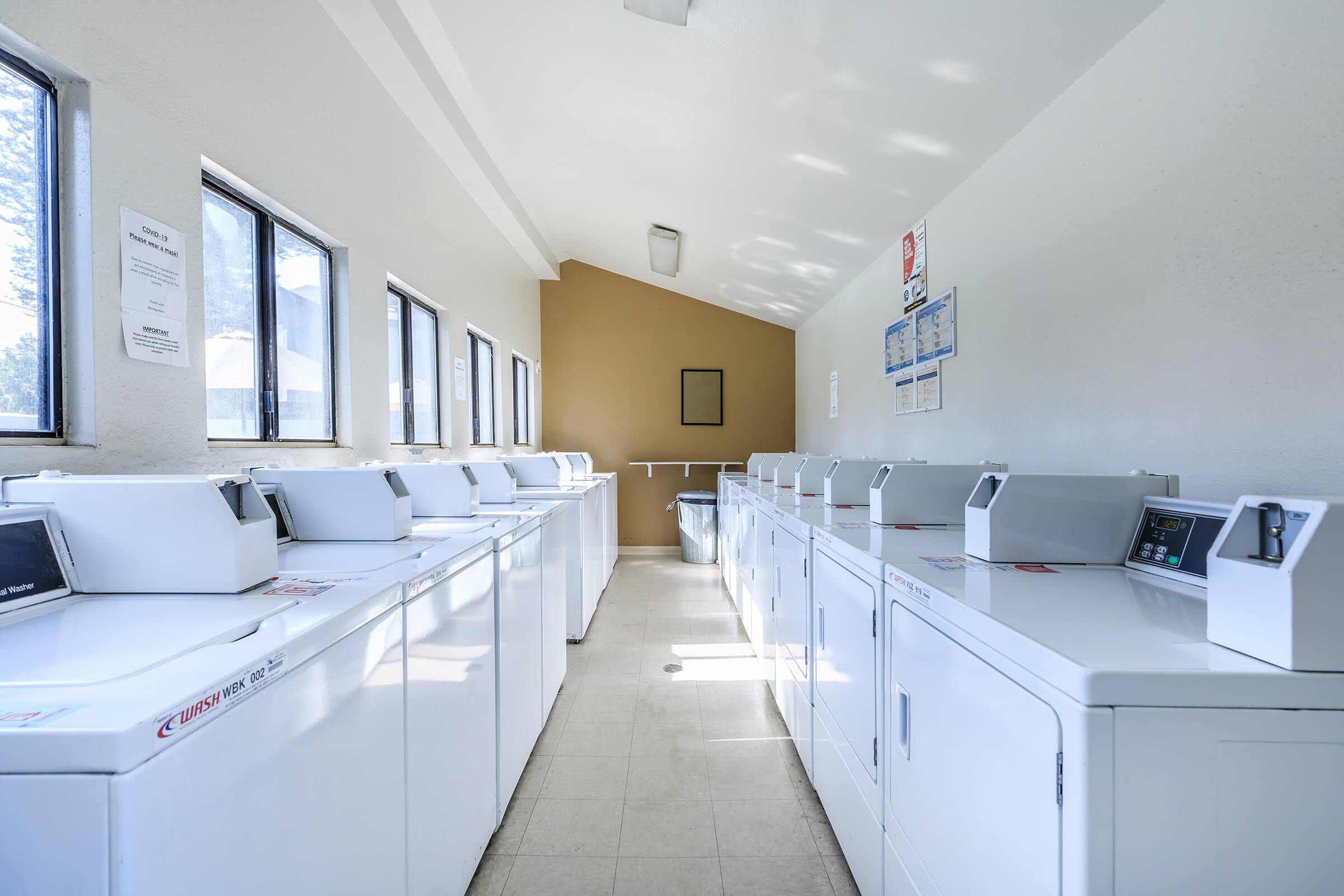 a kitchen with a sink and a microwave