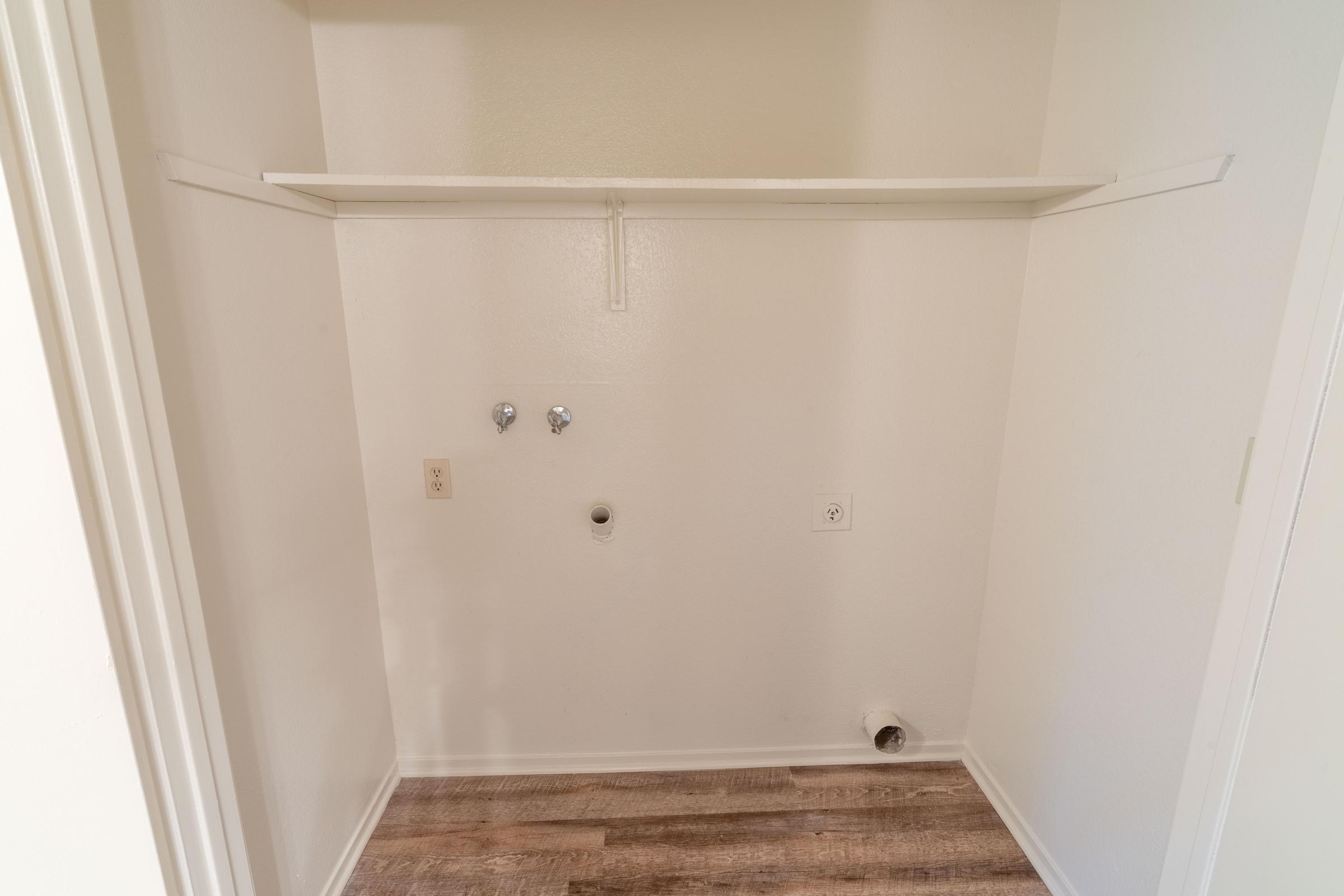 a close up of a shower in a small room