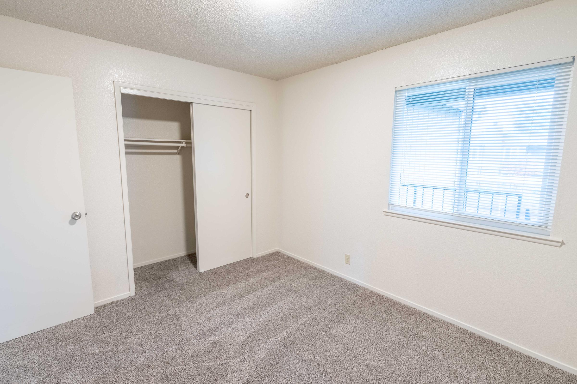 a room with a sink and a window