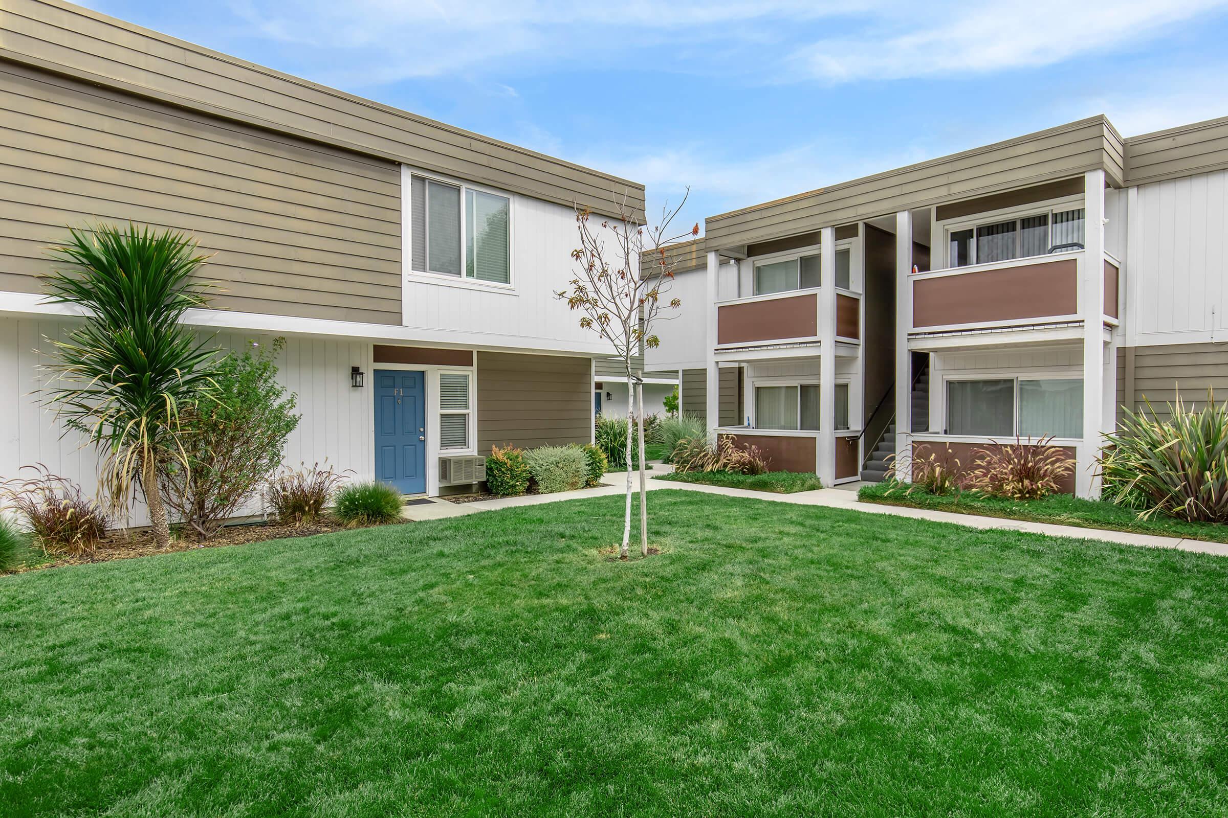 a large lawn in front of a house