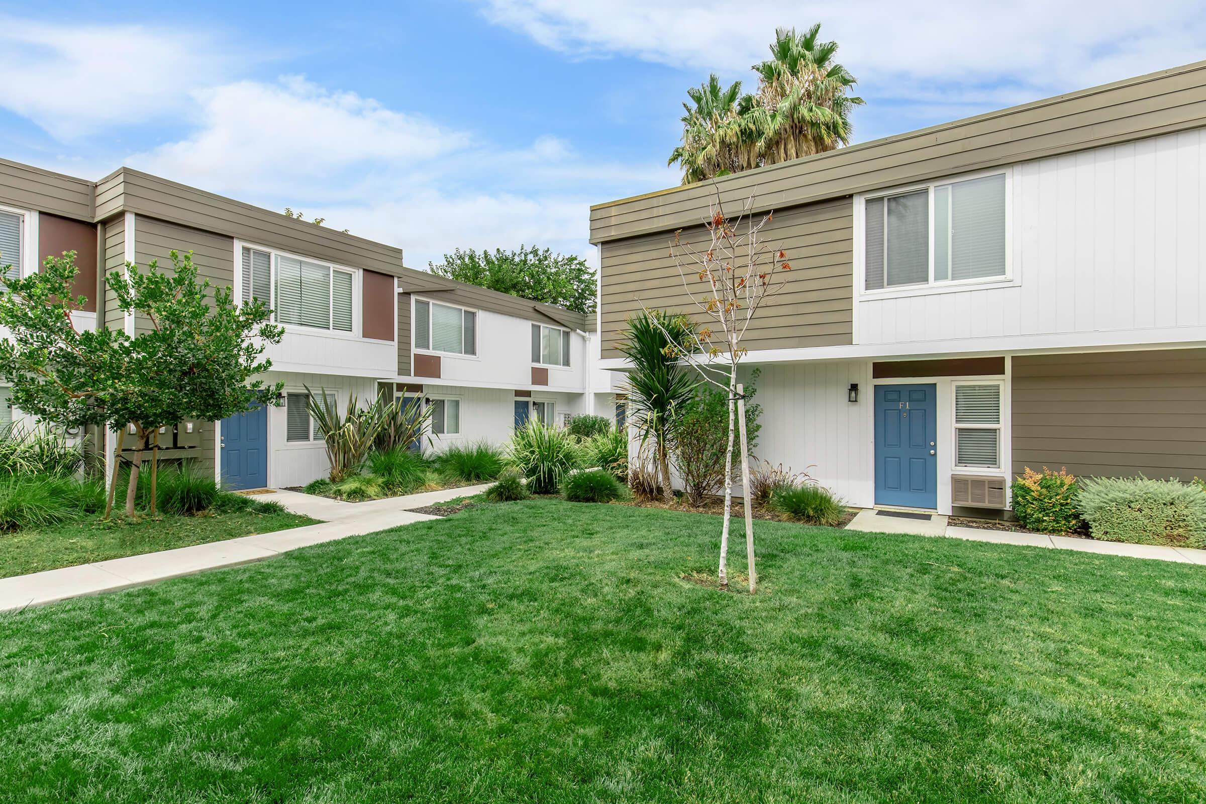 a large lawn in front of a house