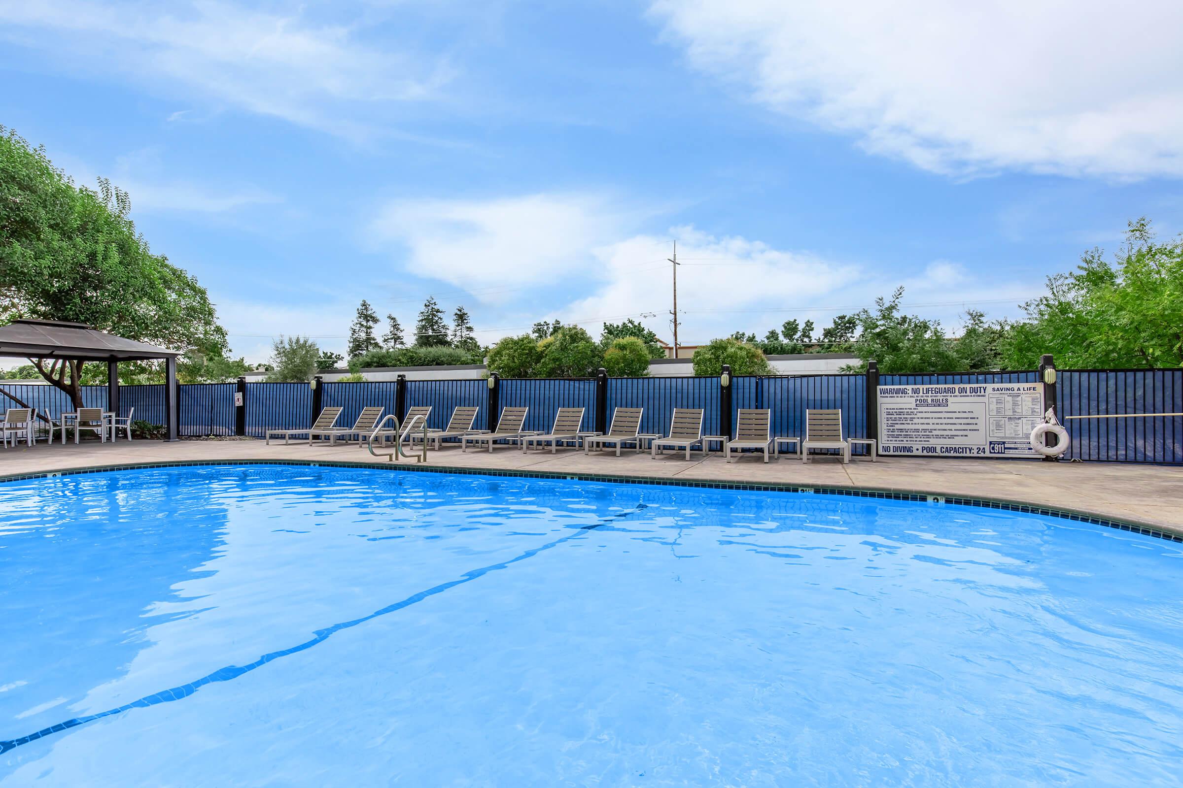 a pool next to a body of water