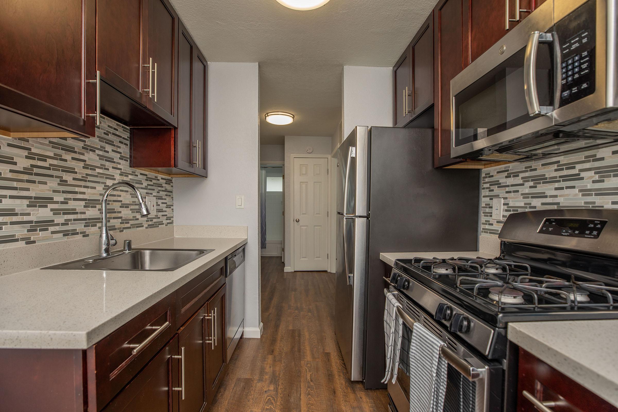 a kitchen with stainless steel appliances