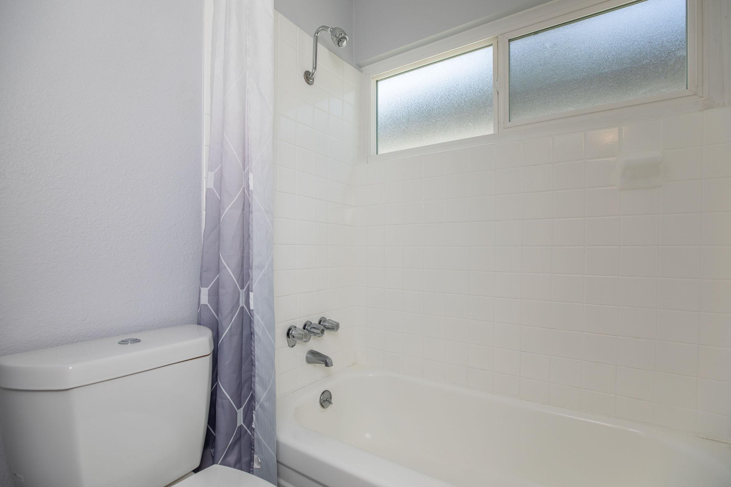 a close up of a sink in a small room