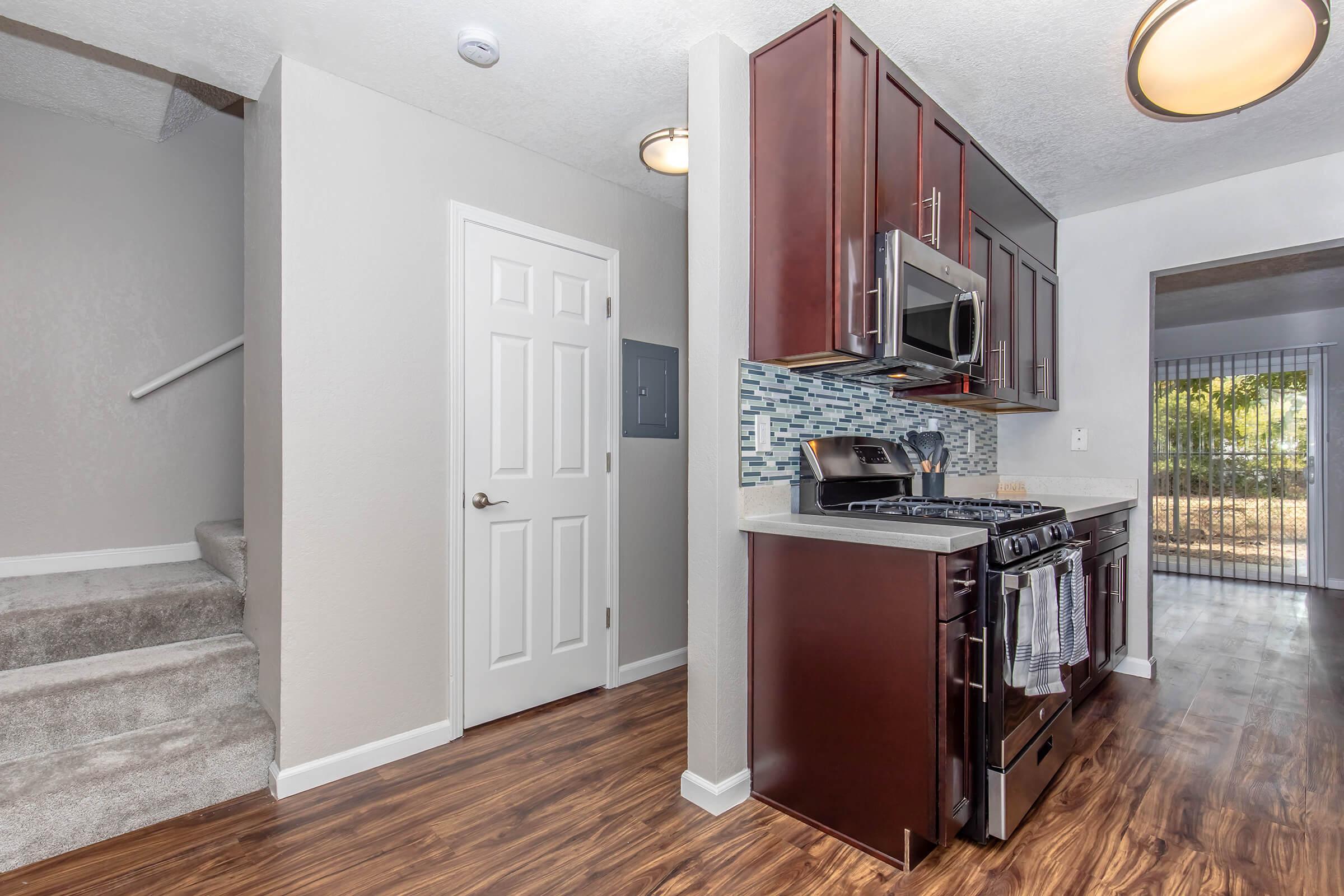 a stainless steel refrigerator in a kitchen