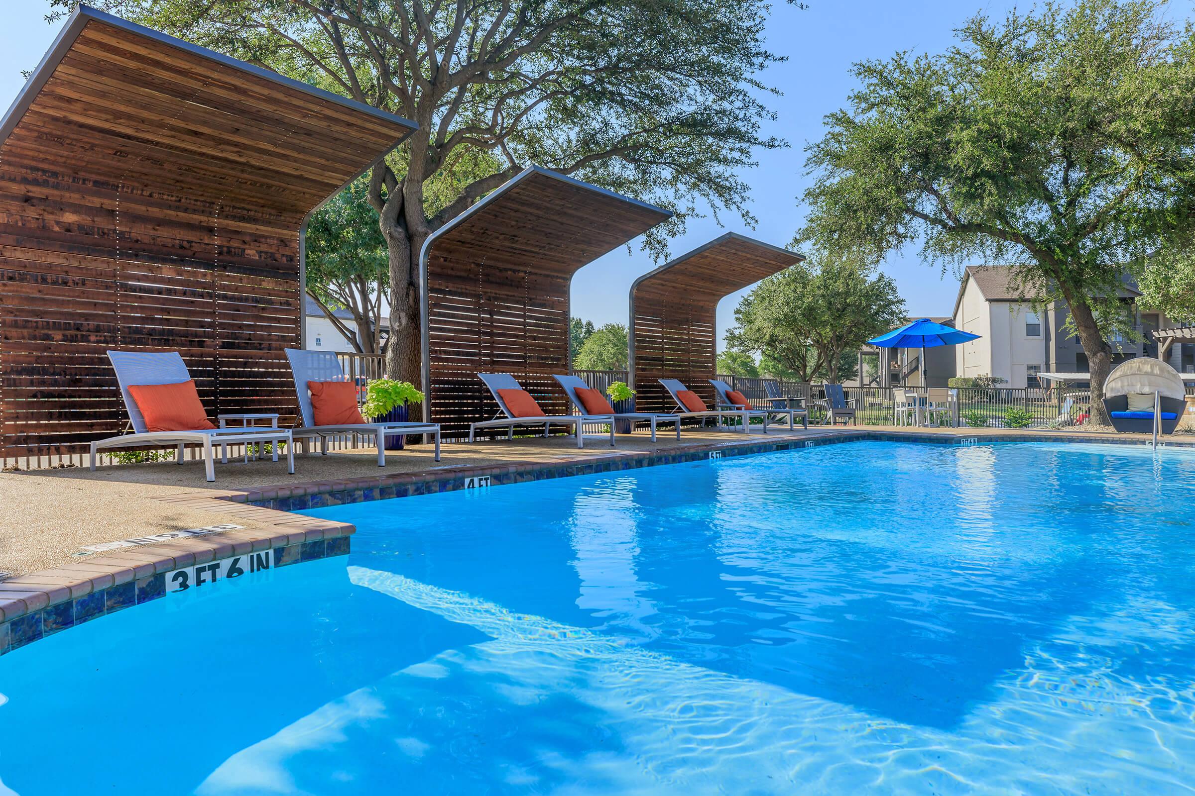 a house with a large pool of water