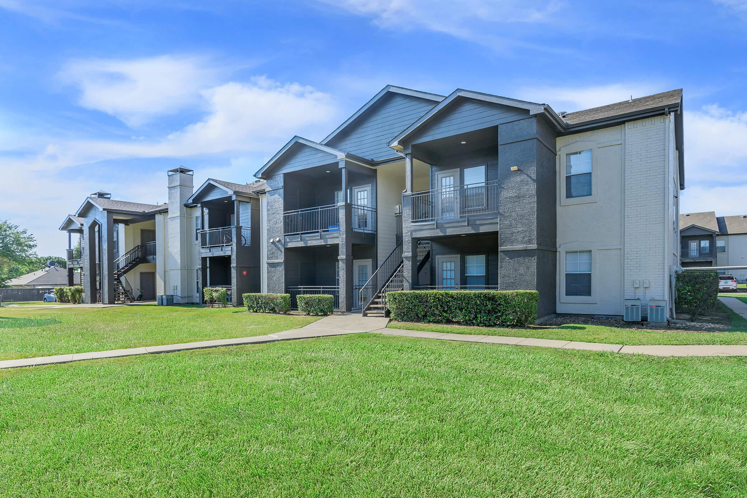 a large lawn in front of a house