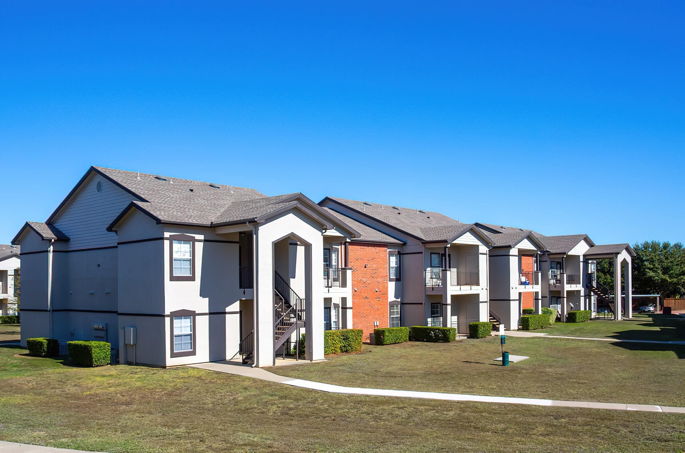 a large lawn in front of a house