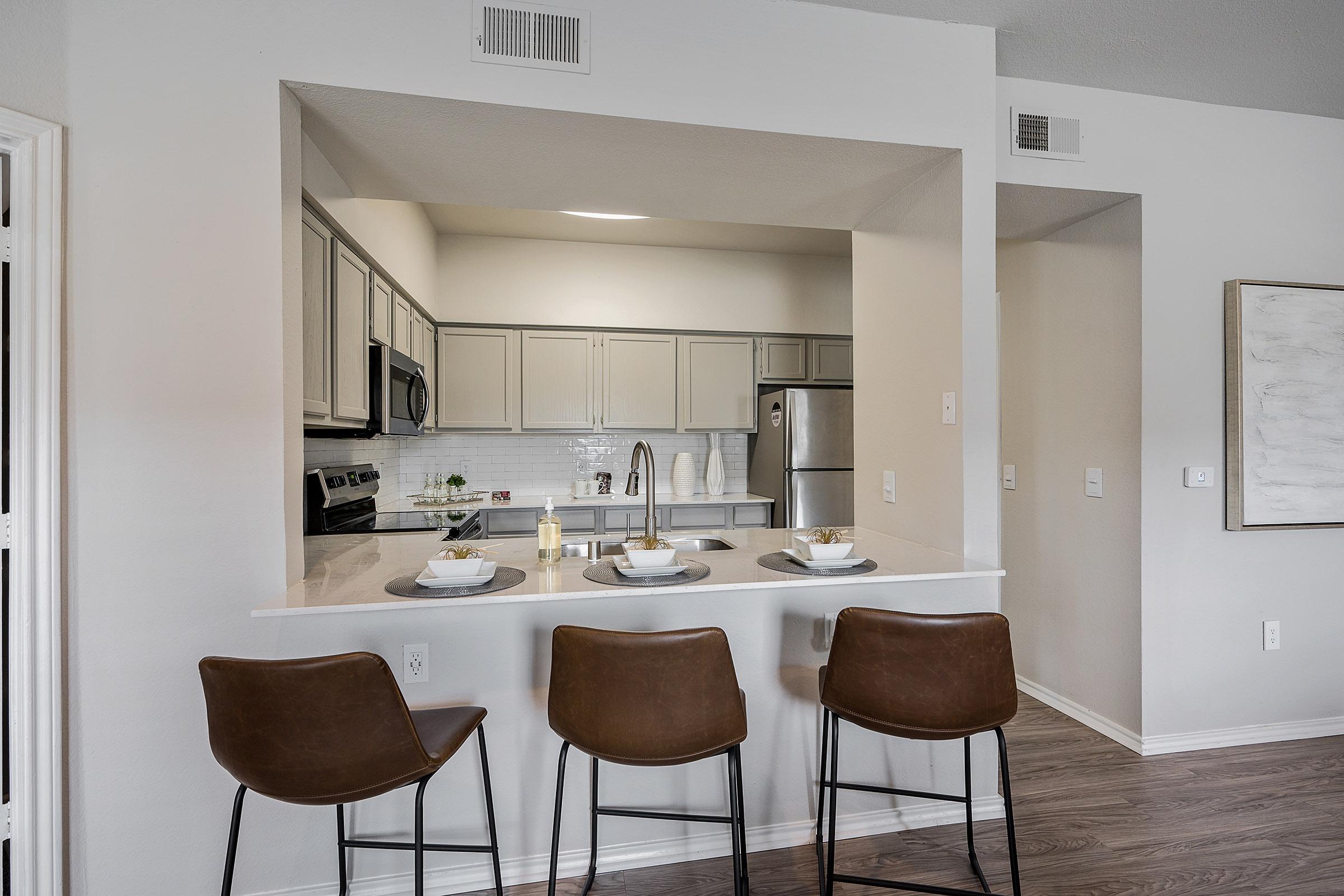 a room filled with furniture and a table