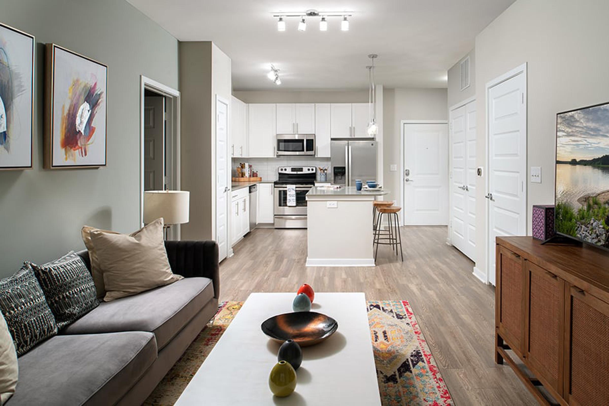 Bainbridge-Lake-Crabtree-Model-Living-Room-to-Kitchen.jpg