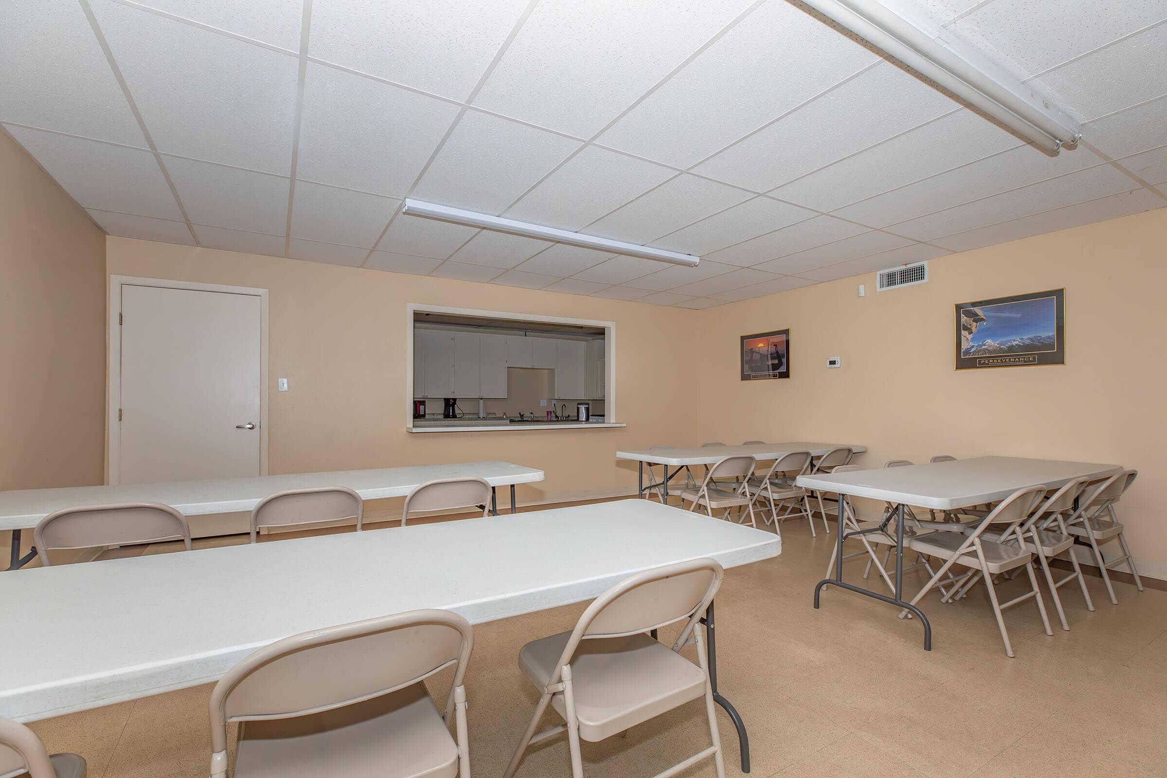 a room filled with furniture and a table