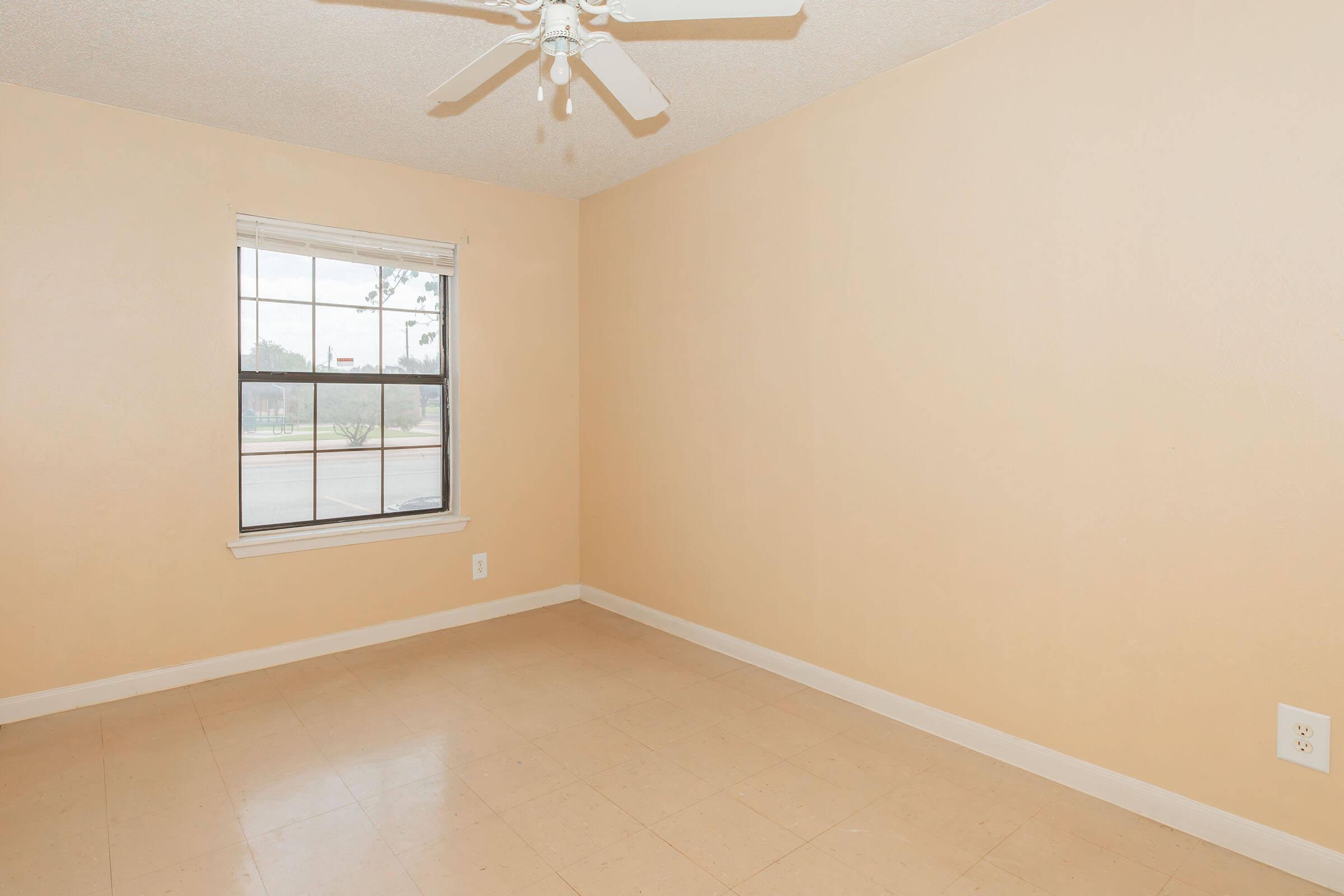 a room with a sink and a window