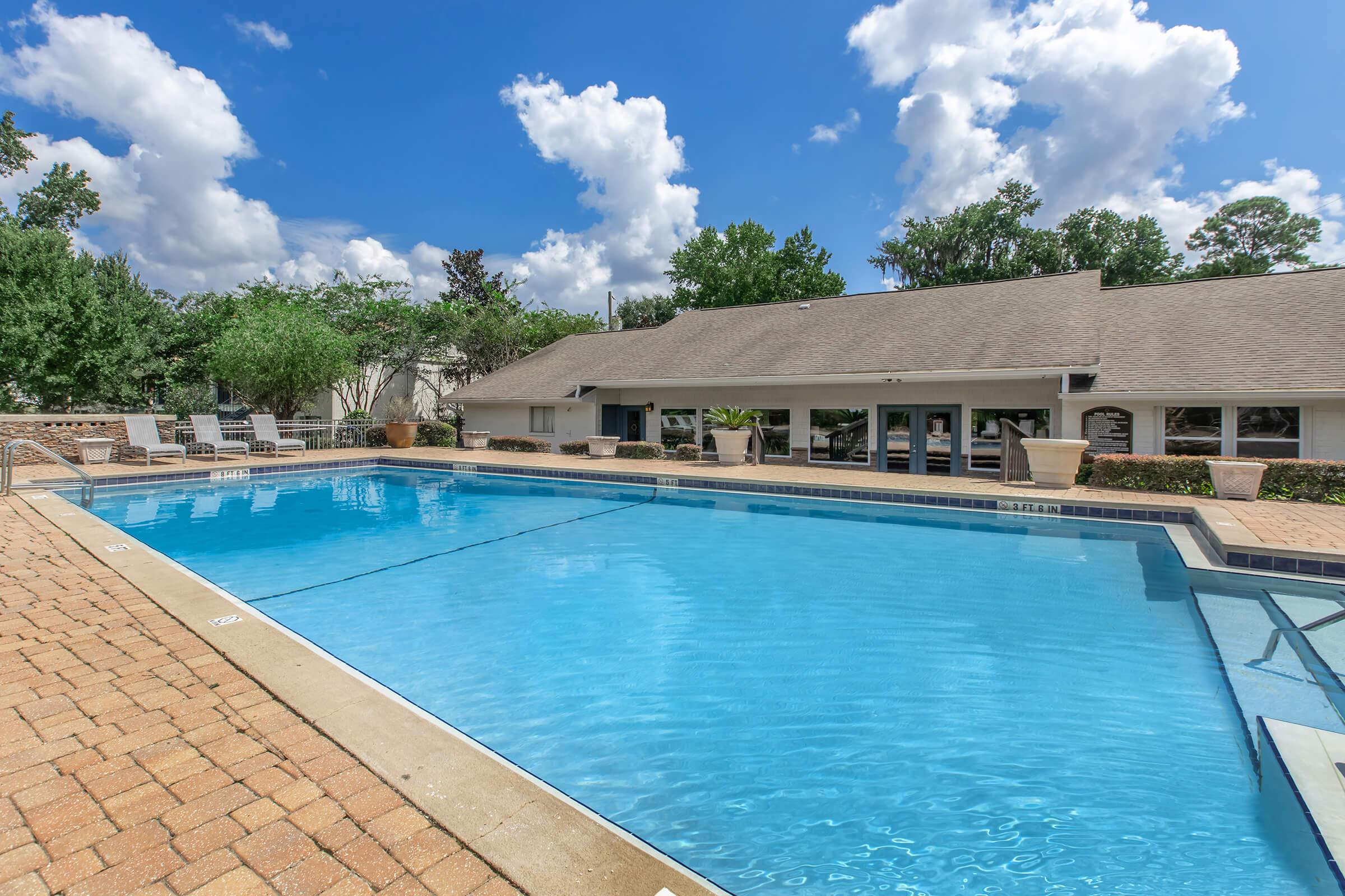 a pool next to a body of water