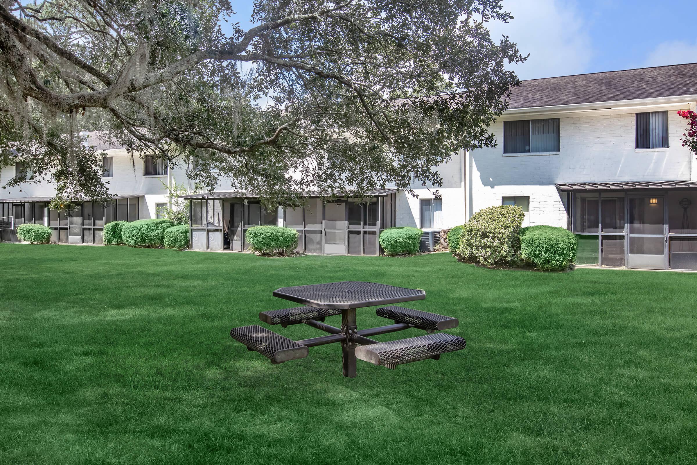 a large lawn in front of a house