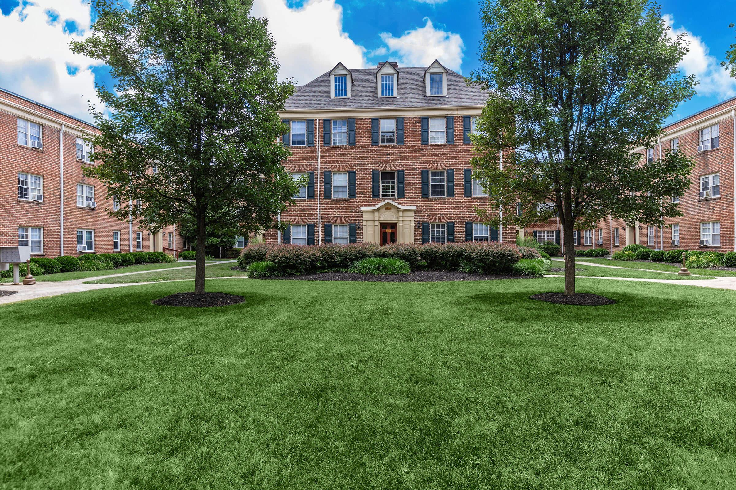 a large lawn in front of a building