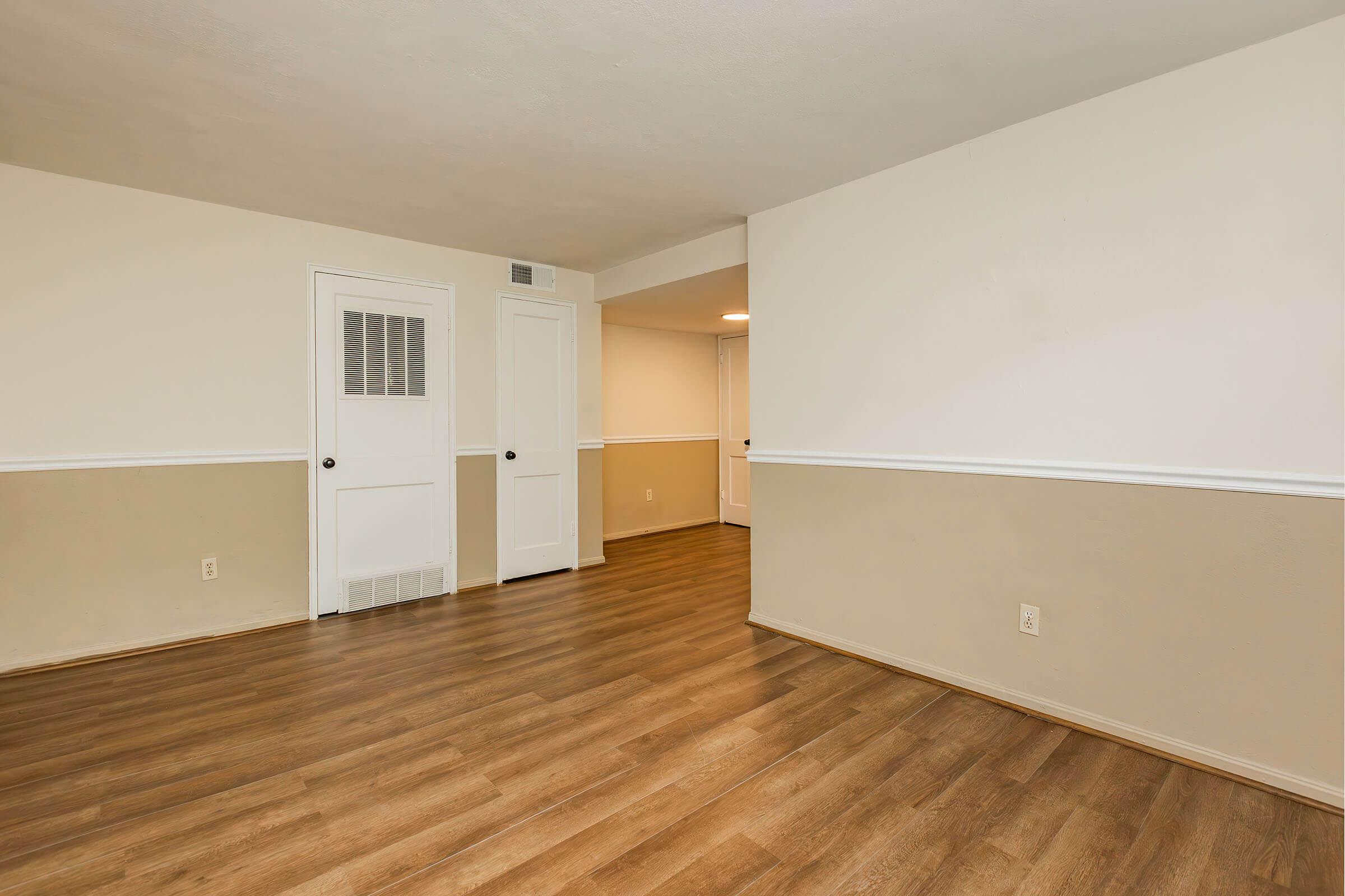 a kitchen with a wood floor