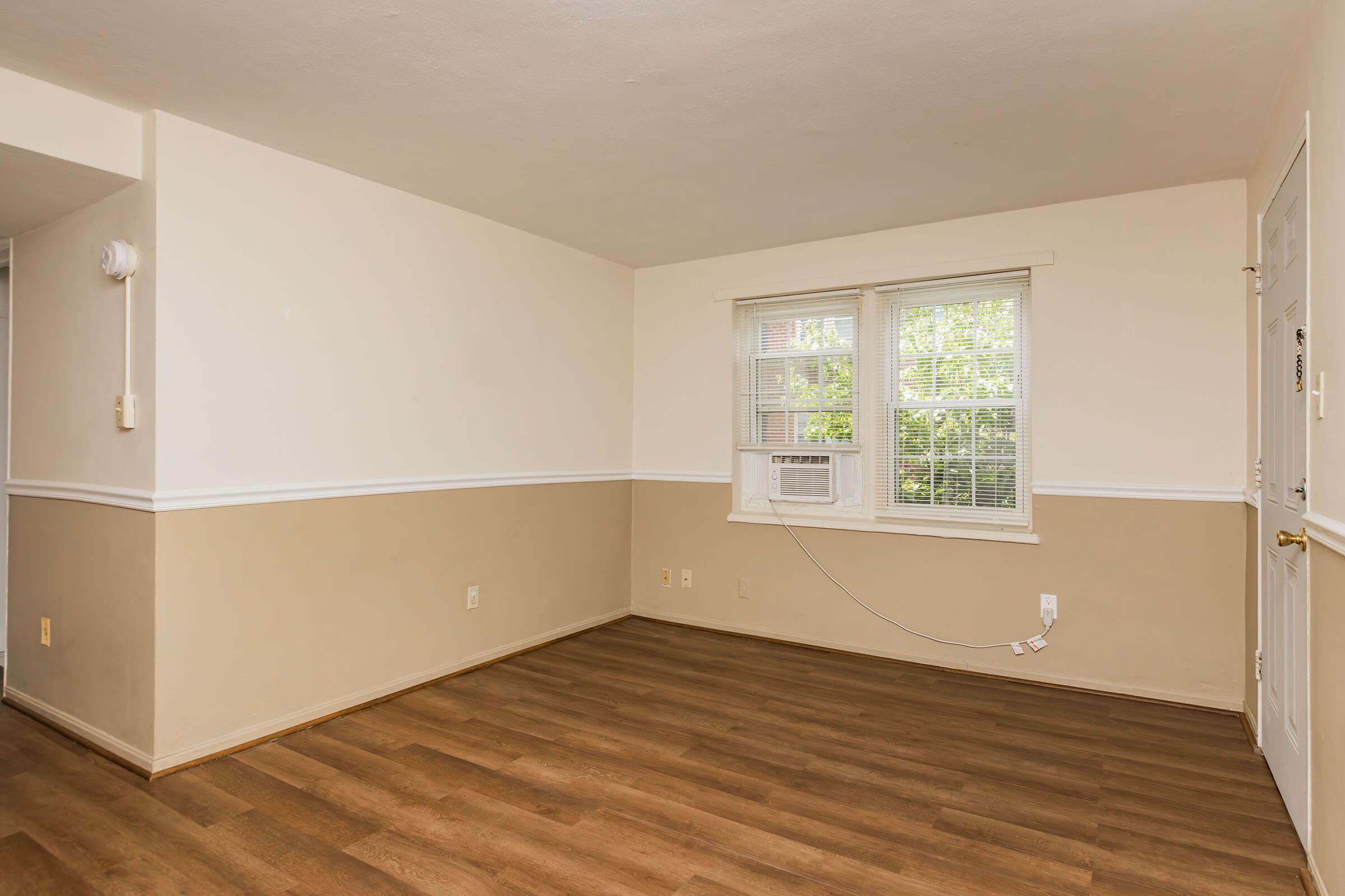 a kitchen with a wood floor