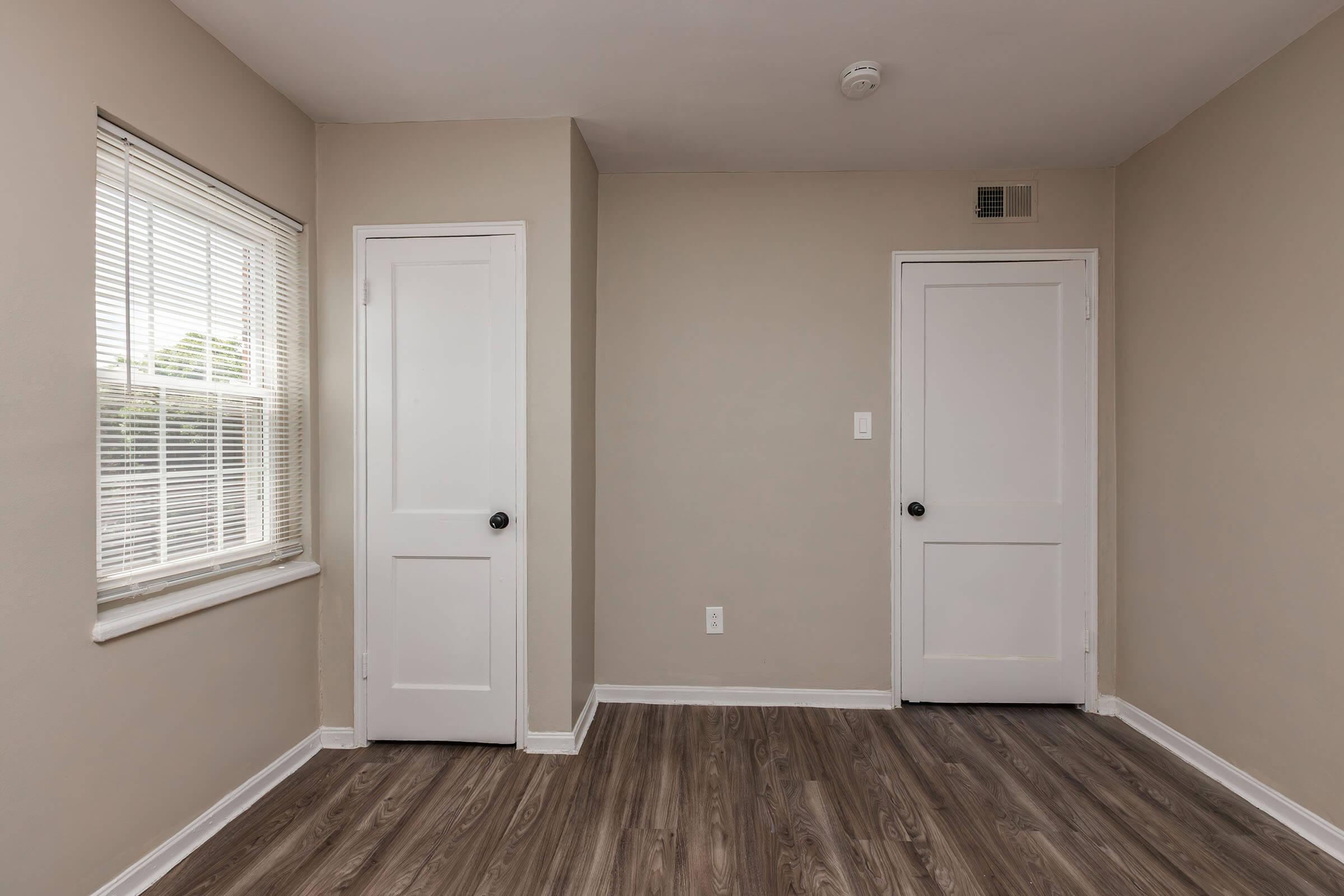 a kitchen with a wood floor