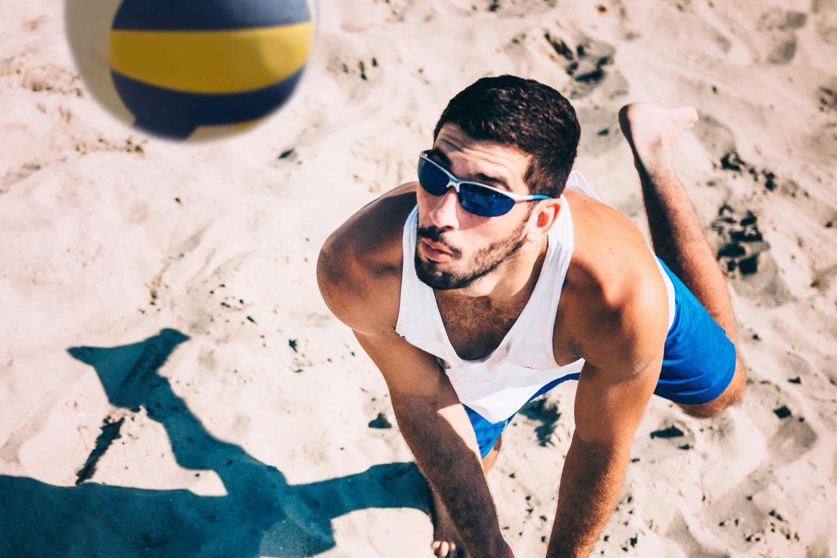 Beach volleyball player receiving the ball, action shot iStock-534567612.jpg