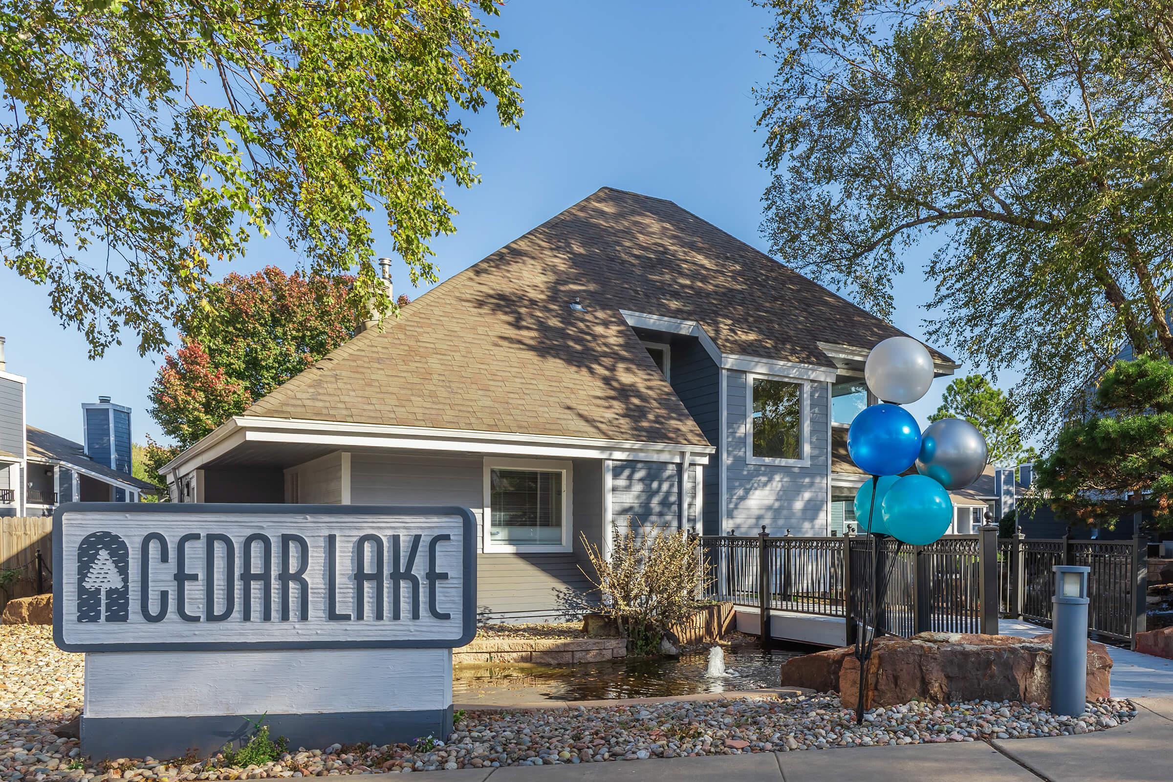 a sign in front of a house