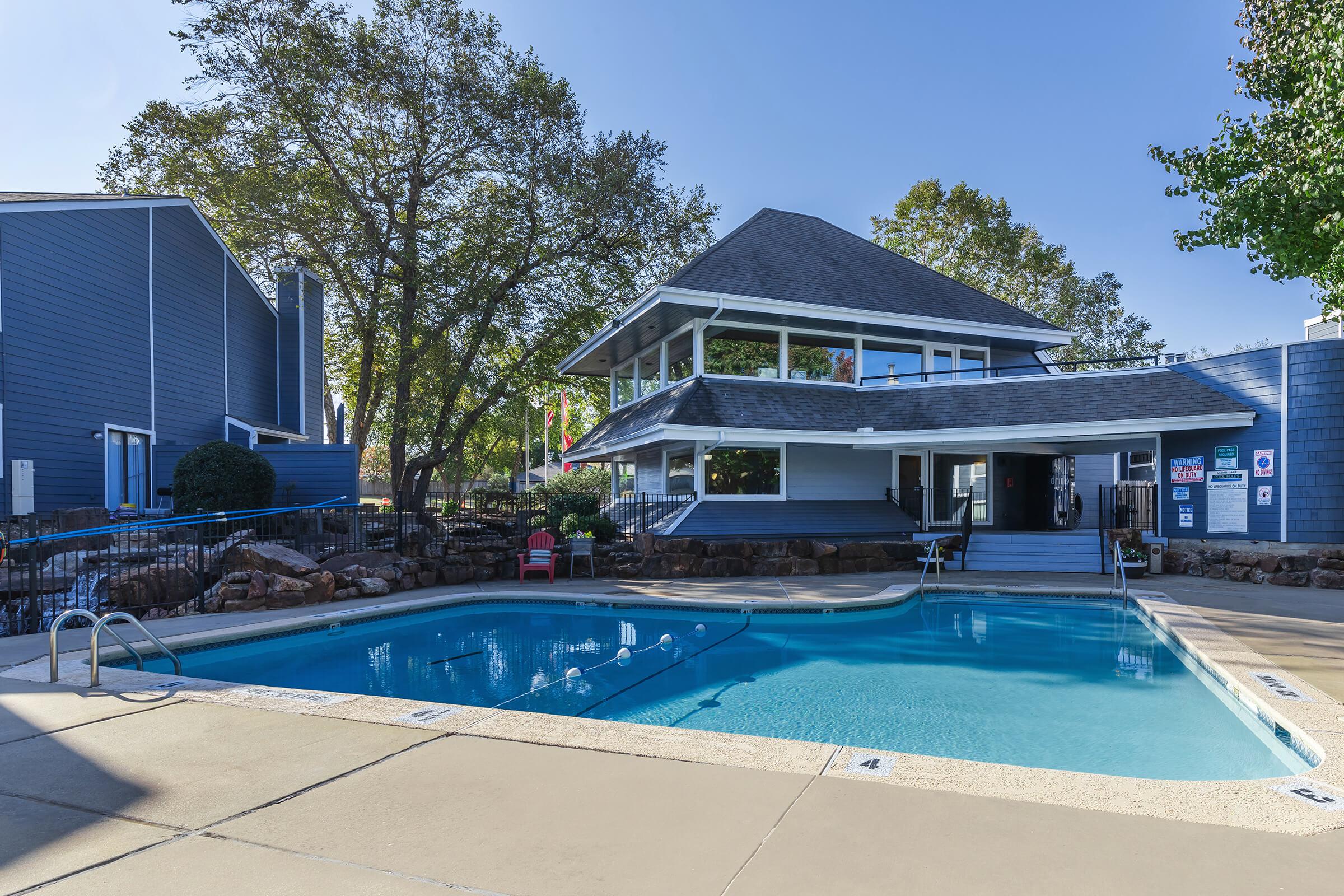 a pool next to a building