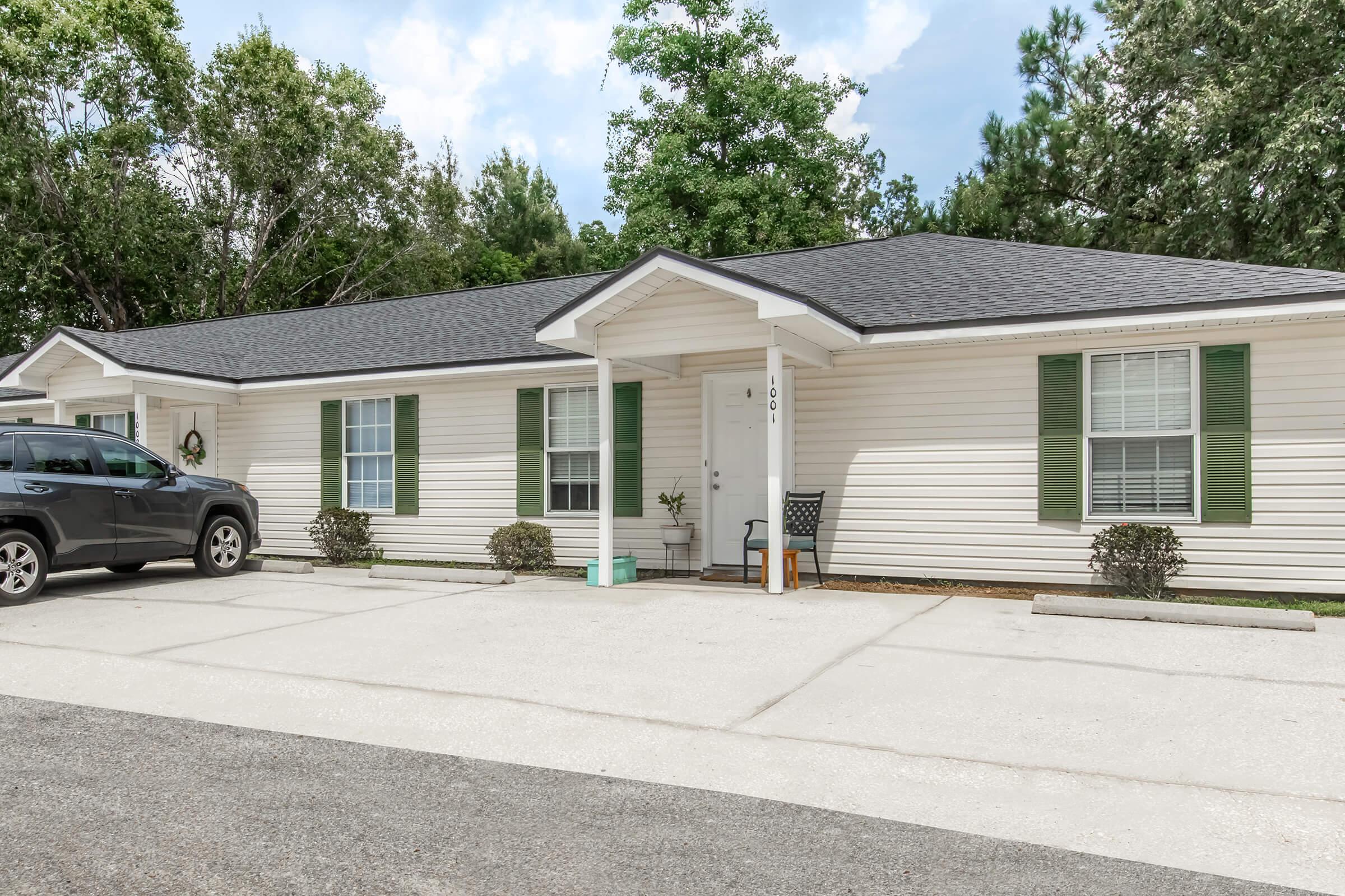 a house that is parked on the side of a road