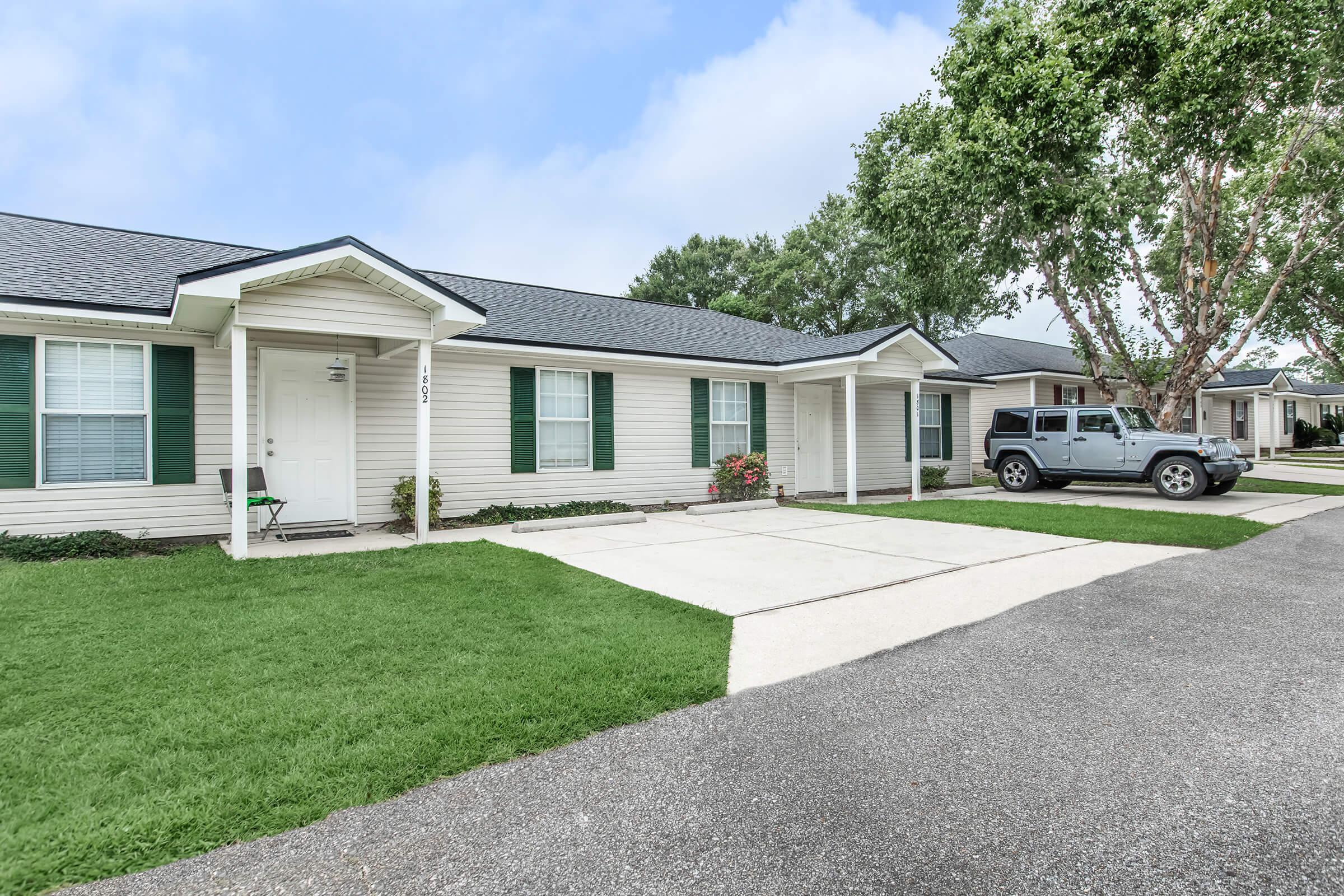 a large lawn in front of a house