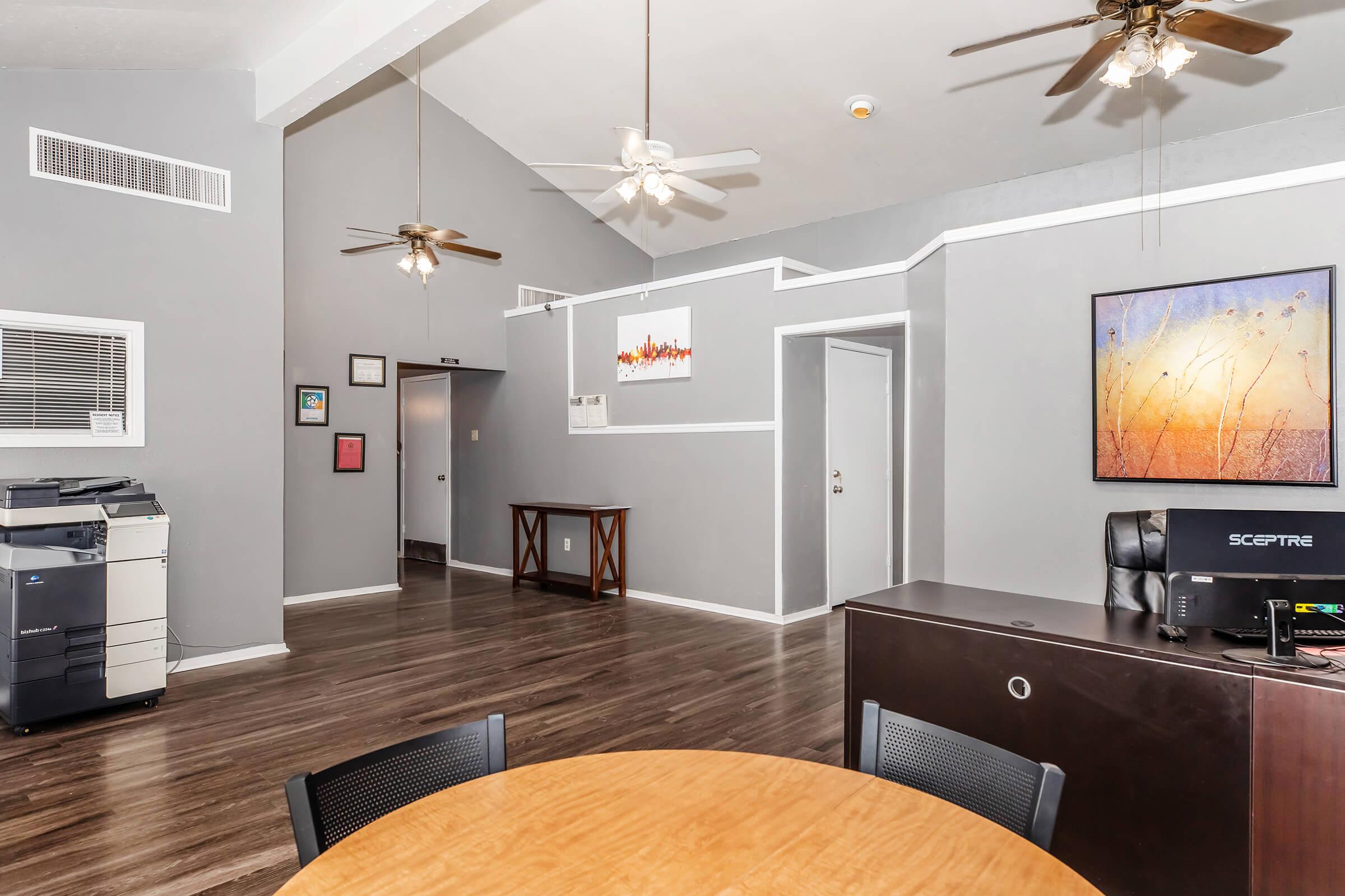 a room filled with furniture and a flat screen tv