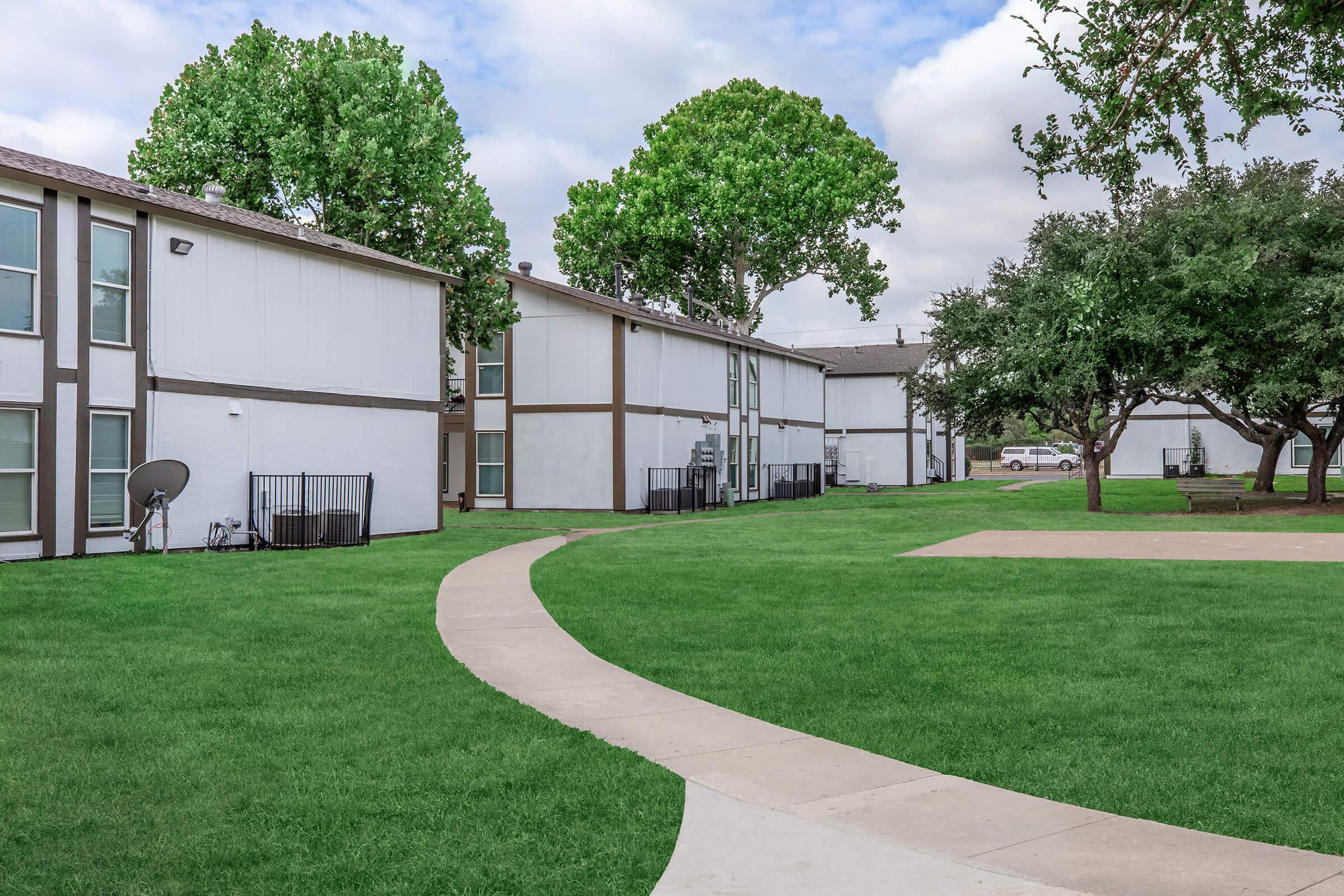 a large lawn in front of a house