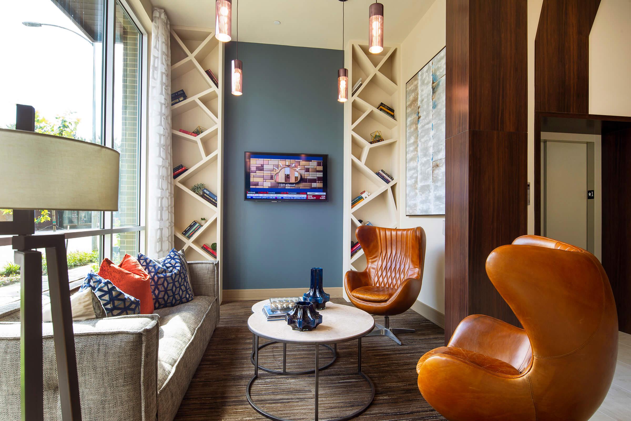a living room with a couch and a chair